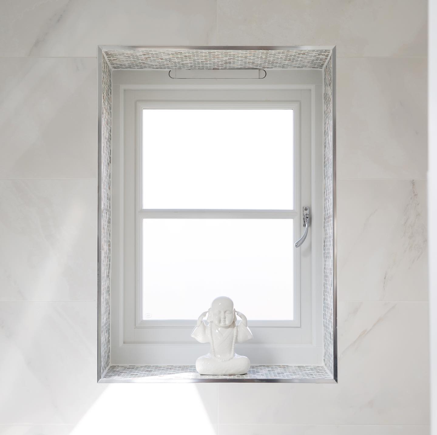 I hope you enjoy the sunshine today and make the most of being outdoors, listening to the sounds of the birds singing and the seeing the first signs of spring. 🌸
We have a few more weeks left in lockdown, maybe we should appreciate the calm before the storm.
The Buddha monk was situated in the window ledge of this tranquil bathroom providing a message do not hear bad 🤍
#interiordesign #interiors #interiorstyling #housedecor #bathroomdesign #tranquility #lightspace #windowledgedecor #accessories #tiles #mosaictiles #spring #sunshine #lucyvictoriadesigns