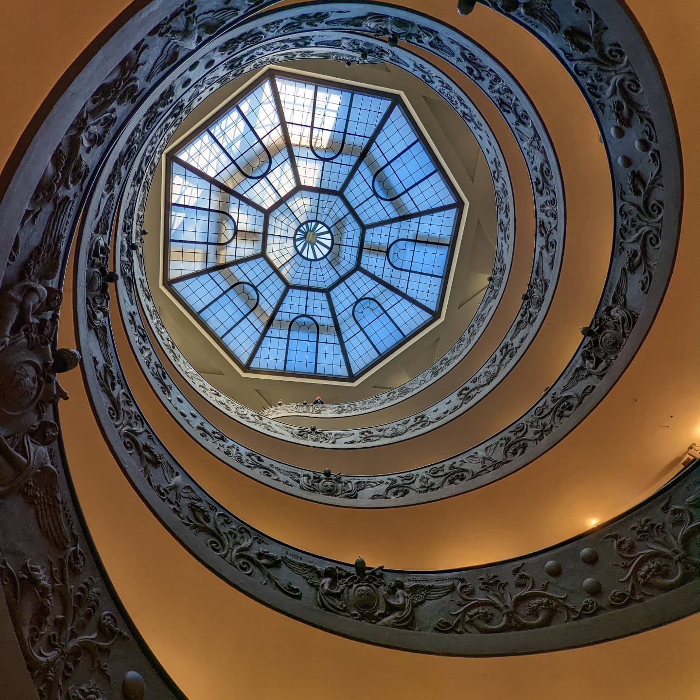 The staircase leaving the Vatican Museums, looking up.