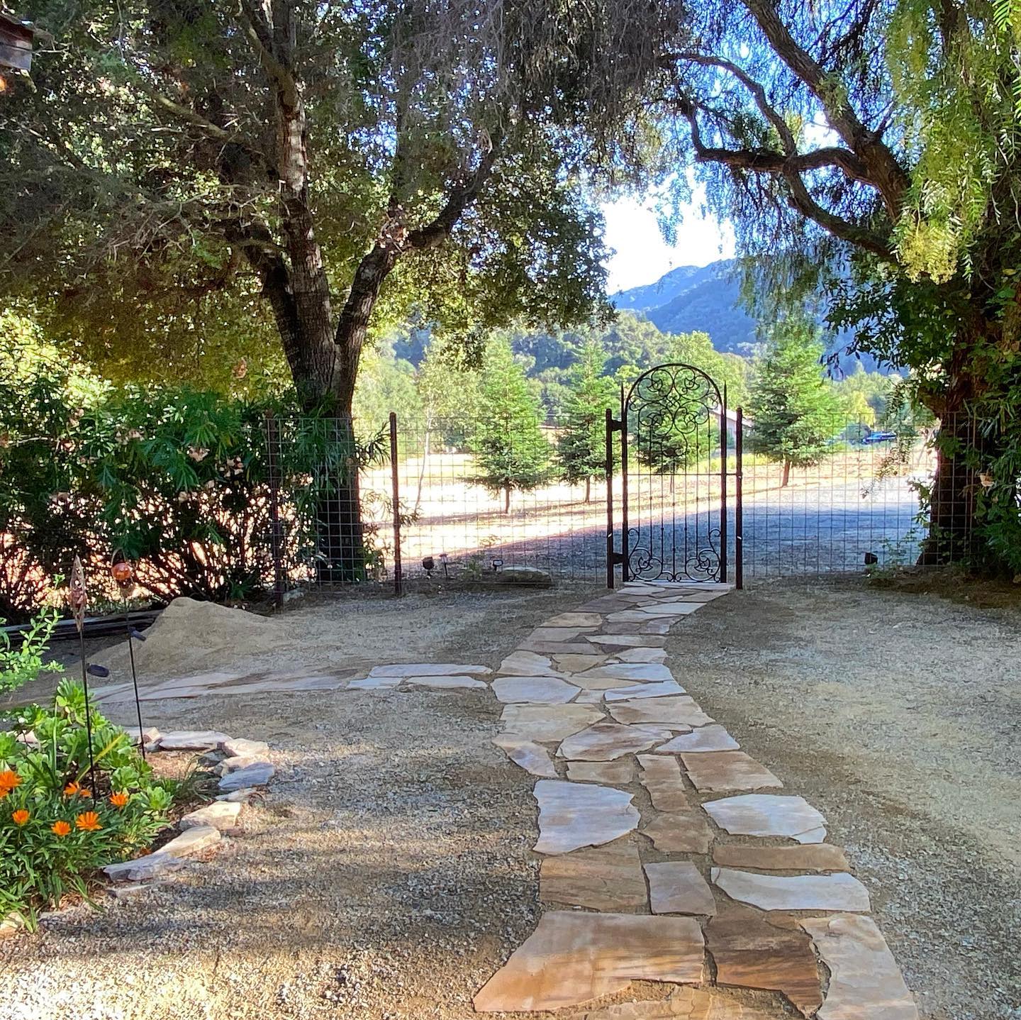 We’ve enjoyed rolling out red carpet for guests, literally, but the new outside shower called for a new walkway from the garden gate to the cabin and down to the shower. Arizona sandstone proved to be the perfect material. Now you can keep those cleaned feet out of the sand and on the sandstone path to that cozy bed and warm fireplace.