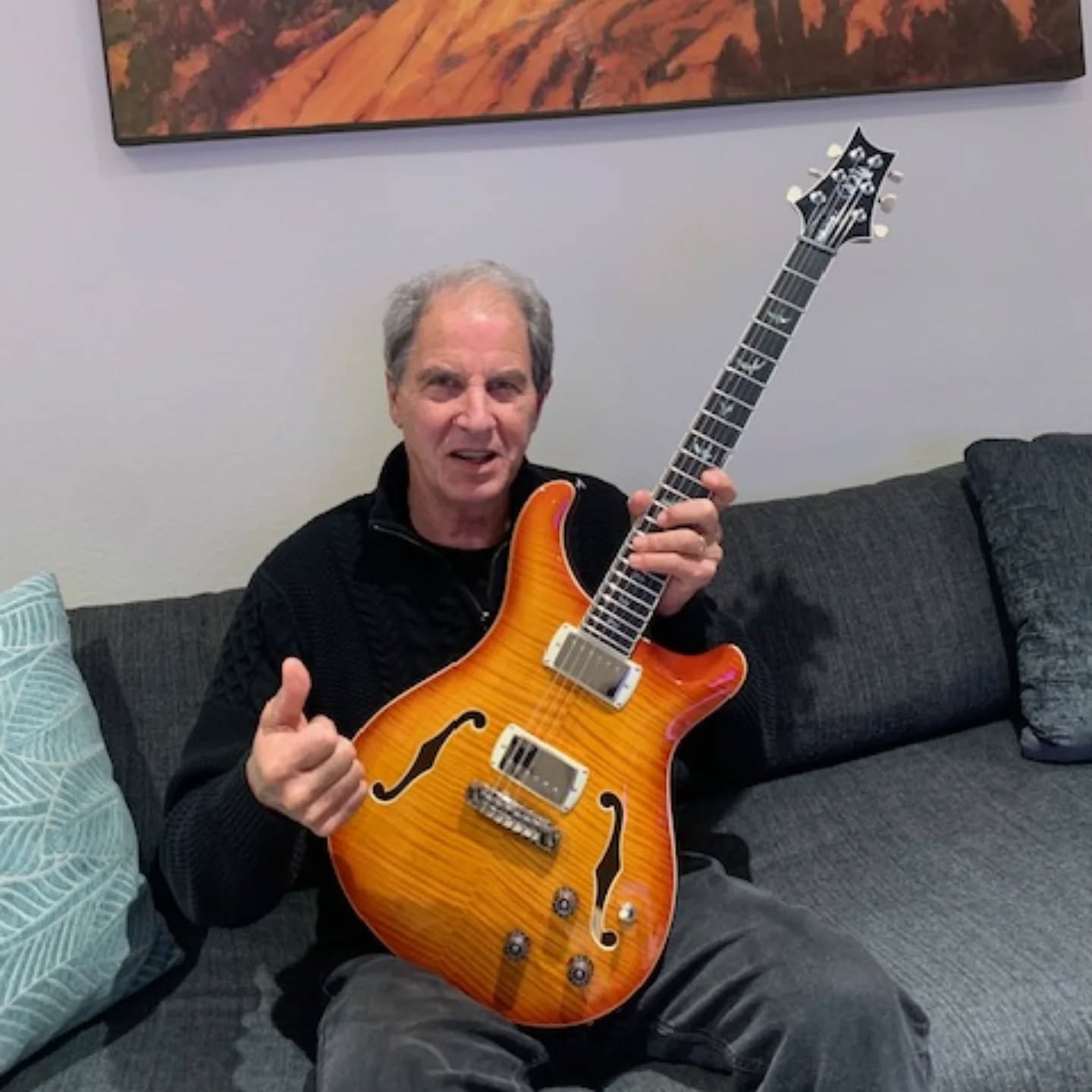 Testimonial time!
My client, Josh, brought me a blue PRS hollow body a while back. I determined quickly that I could not set it up because it had a structural failure (a workmanship defect from the factory build) under the bridge that was causing the bridge to be pulled toward the headstock. My action was to reach out to PRS on his behalf to get the return process going, and then I shipped off his guitar to PRS for further eval.
They determined that indeed there was a structural defect, and that my client would be entitled to a new guitar. So, here's Josh and his new beautiful sunburst PRS hollow body! These are the words Josh shared with me, which were heartwarming:
"Dear Dan,
I finally received my brand new PRS SE Standard Hollowbody guitar from PRS last week! I waited months for them to get in their shipment of new guitars, but it finally came! In beautiful natural sunburst, as I requested.
This is all thanks to you, your willingness to pursue this repair with PRS, taking the initiative to send photos of my broken guitar to them, then sending my guitar to PRS for repairs.
I thank PRS as well, for when they analyzed the problem, they determined that they would give me a brand new guitar to replace mine. That has now happened (see the enclosed photo). Matt King at PRS has been amazing throughout this whole process!
Dan, I'm so grateful to have met you! Most others would have never responded to this situation with such integrity and selflessness! You put yourself out there for a stranger, when you really didn't have to. That says volumes about you and your character and professionalism.
I'm a happy man (and my wife loves the guitar too!) and I attribute it all to you!
Thank you again, and I will recommend you to all of my friends and acquaintances! "