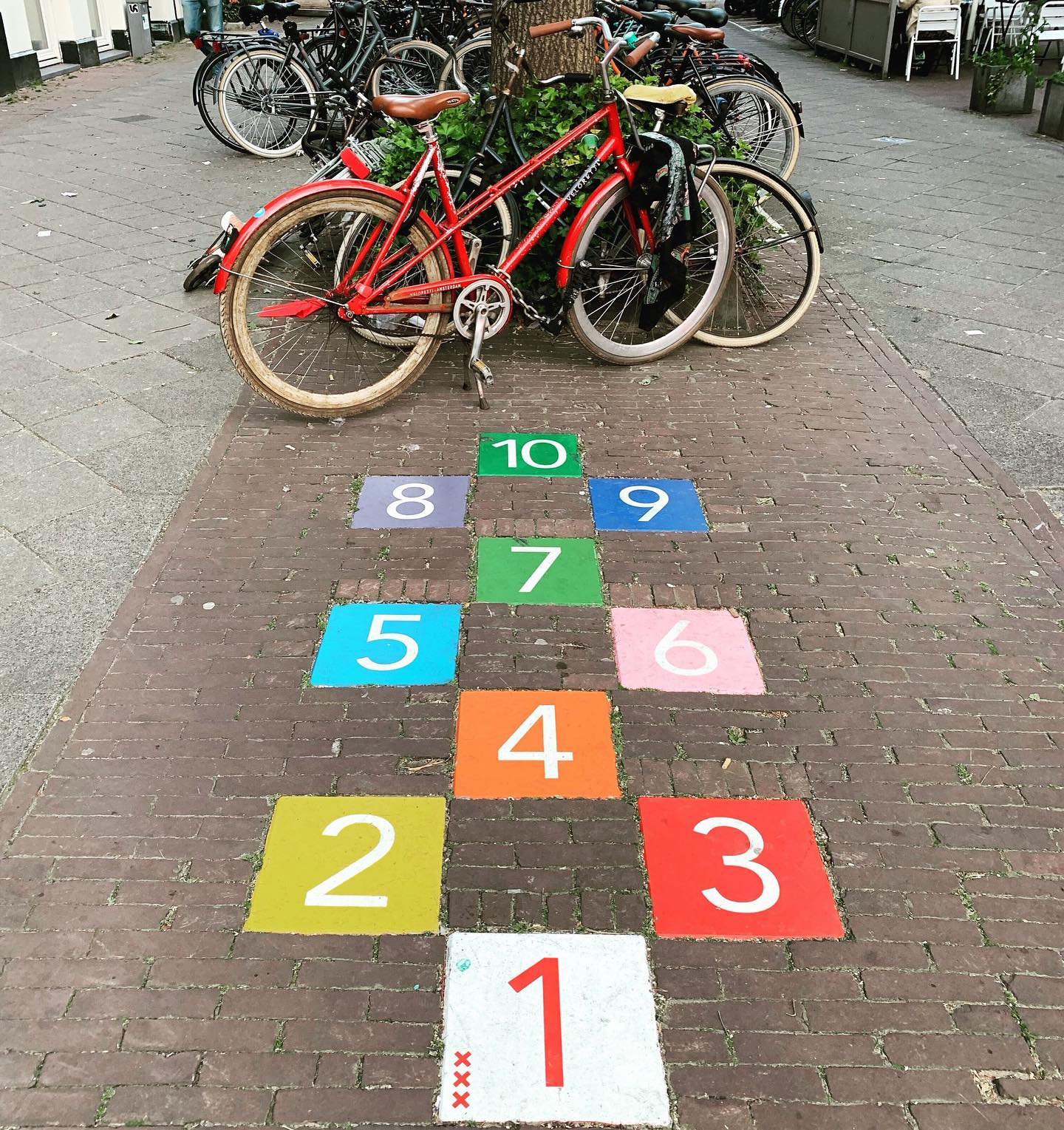 A playful graphic integrated into a paved surface can trigger a moment of play and joy for children and adults alike! An easy way to remind ourselves that streets are for more than just cars! 🛹🛴🚲
.
.
.
#citiesforplay #playfulcity #childfriendlycity #play #learningthroughplay #urbandesign #placemaking #publicspace #urbanplanning #citymaking #urbanchildhoods #citylife #urbanista #planning #citylab #citiesforpeople #playmatters