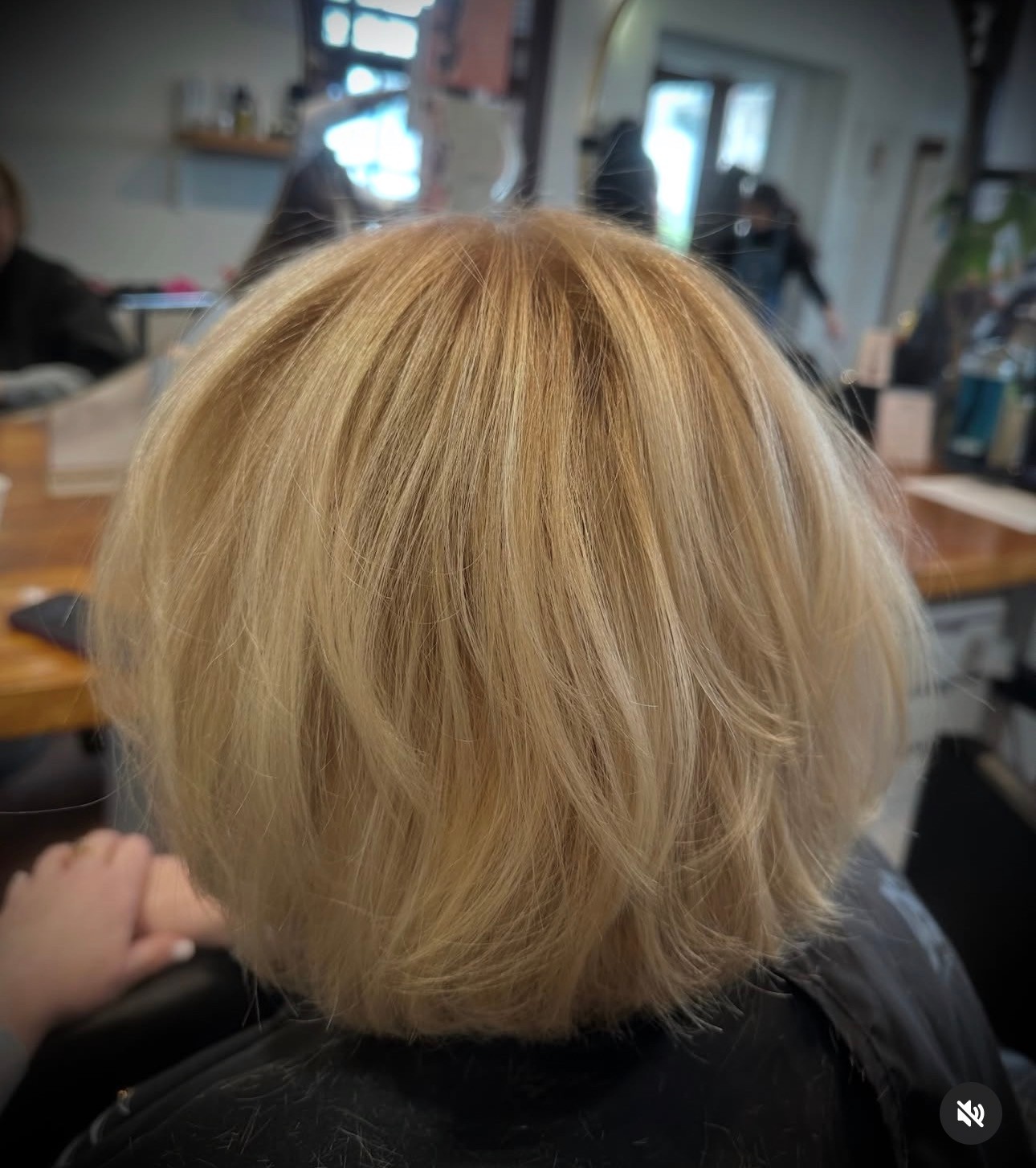 Make it bright but with dimension! New Talent Jennifer did lowlights and highlights on this client and then added a few layers with her haircut.