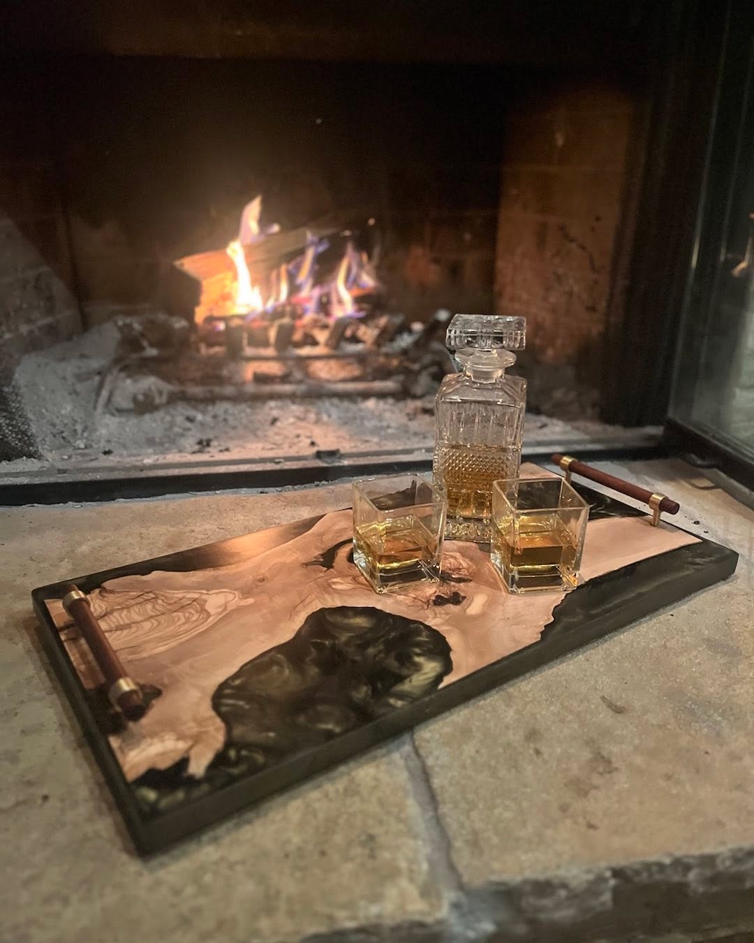 Live edge olive and green/black resin tray with brass and walnut handles.