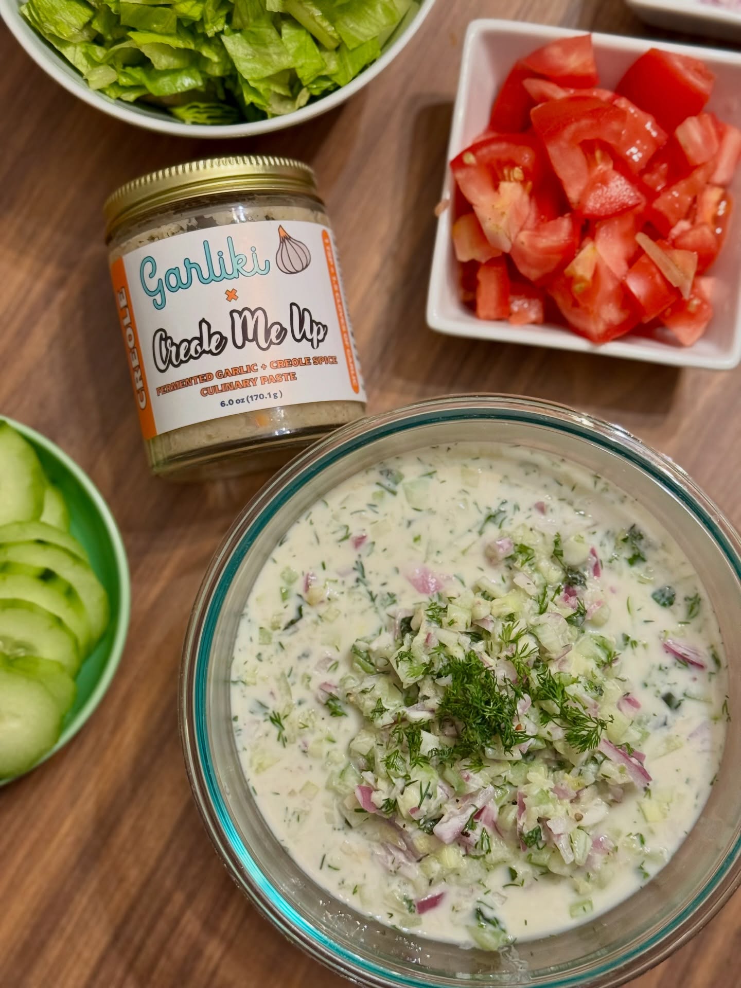 Homemade Tzatziki with a kick 🤤
Here’s how we did it ~
1/2 Red Onion
1 Cucumber
3 Tablespooms of Creole Garliki made in collaboration with @creolemeup
Juice of 1/2 Lemon
3/4 Cup Kefir
Bunch of Dill
Bunch of Mint
Salt & Pepper to taste
Mix it all together and enjoy!
Tzatziki has so much flexibility when it comes to your flavor preferences. Want more of a garlic punch (because, same)? Add more Garliki. Want that mint flavor to come forward? Ramp up the mint.
Don’t be afraid to get creative in your kitchen! And add @garlikipaste anywhere anytime you would use fresh garlic!