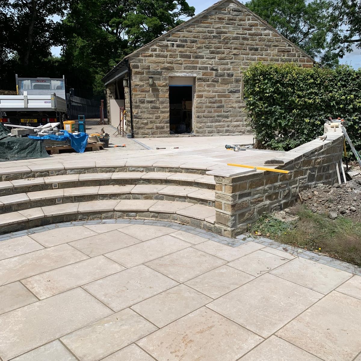 Stunning stone patio and steps with built-in lighting for a stately home in South Yorkshire.