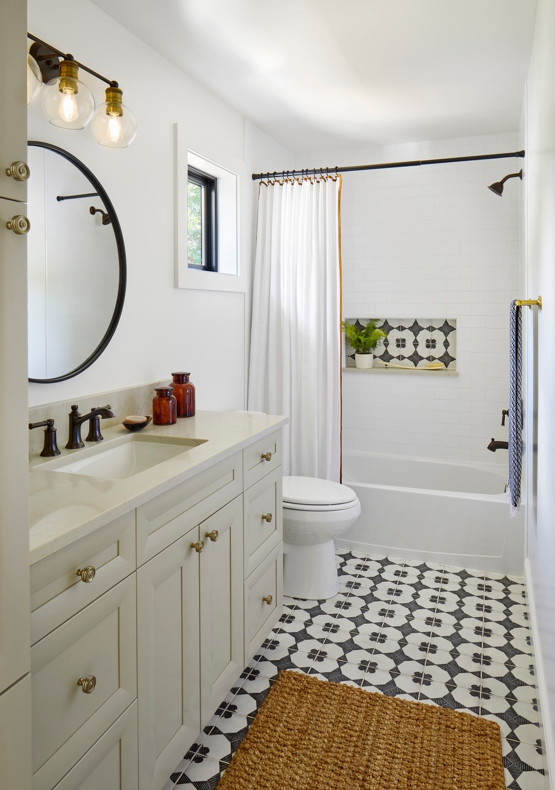 ✨ Bold contrasts and warm elegance! ✨
This bathroom strikes the perfect balance with warm beige cabinets, elevated by luxurious gold and black accents. The real showstopper? The strikingly contrasting floor and shower niche tiles, bringing a dynamic and unforgettable vibe to the space.
💡 Design Tip: Contrasting tiles can add depth and dimension to your design—don’t be afraid to mix patterns and finishes for a truly unique look!
#BathroomInspo #BoldDesign #EverydayLovelyDesigns #WarmElegance #InteriorDesignMagic
Project: Neilson
Builder: @smithandmeade
Photographer: @susiephoto
Stylist: @tawneywaldo