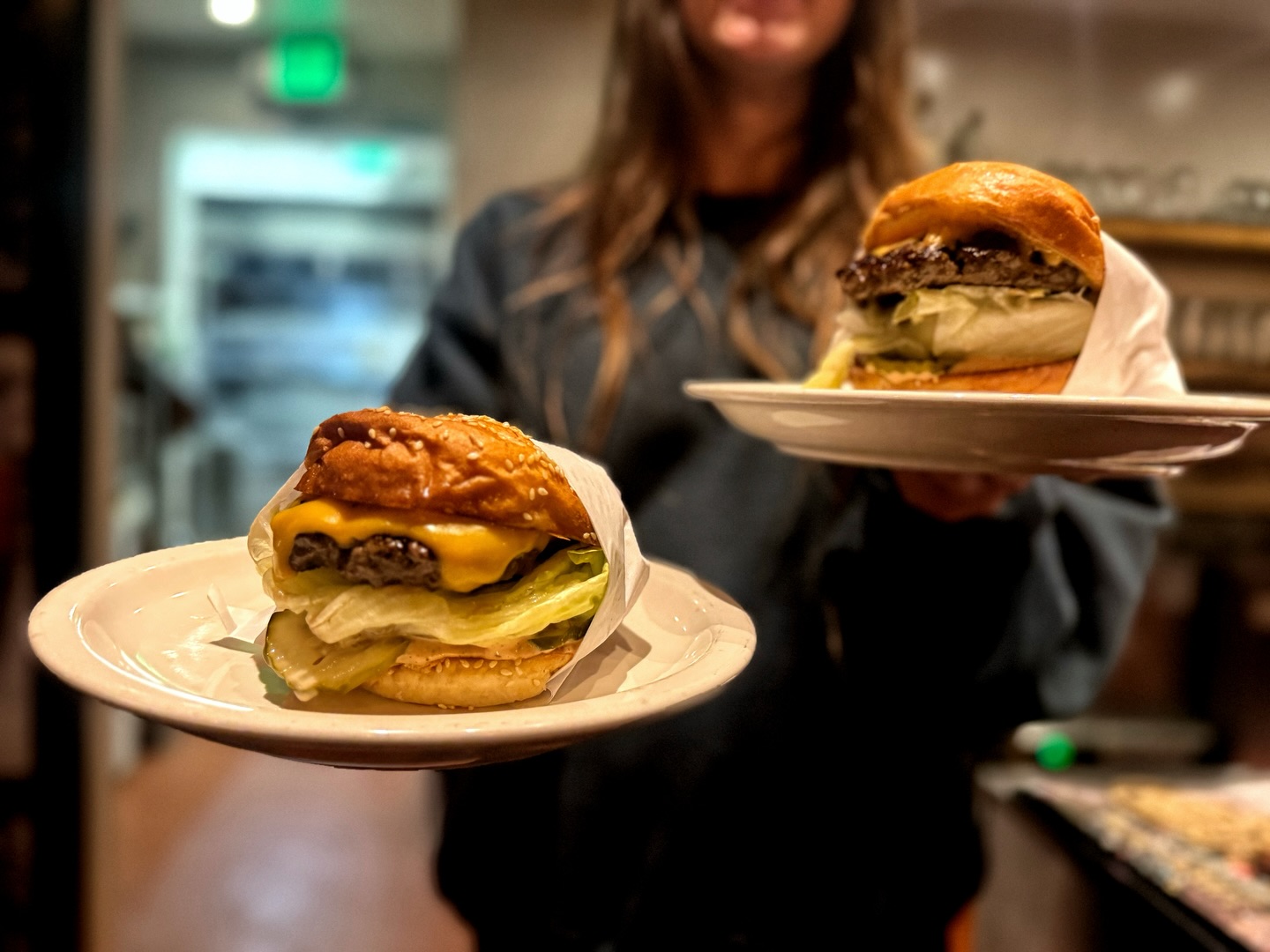 The @pitchforktbeef Burger from The Barn Kitchen & Restaurant has a way of cutting through the noise & reminding us that good food, shared tables, & a little joy go a long way. Let us make your day a little bit better - with a really good burger in your hand. Served 7 days a week at @thebarninsisters.