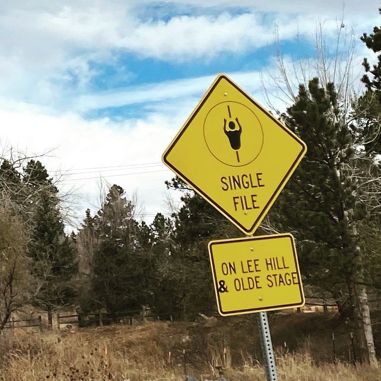 Please follow the signs and speed limits for the safety of all. #singlefile #bike sign on #leehilldrive in #bouldercounty . #bikesbesafe
