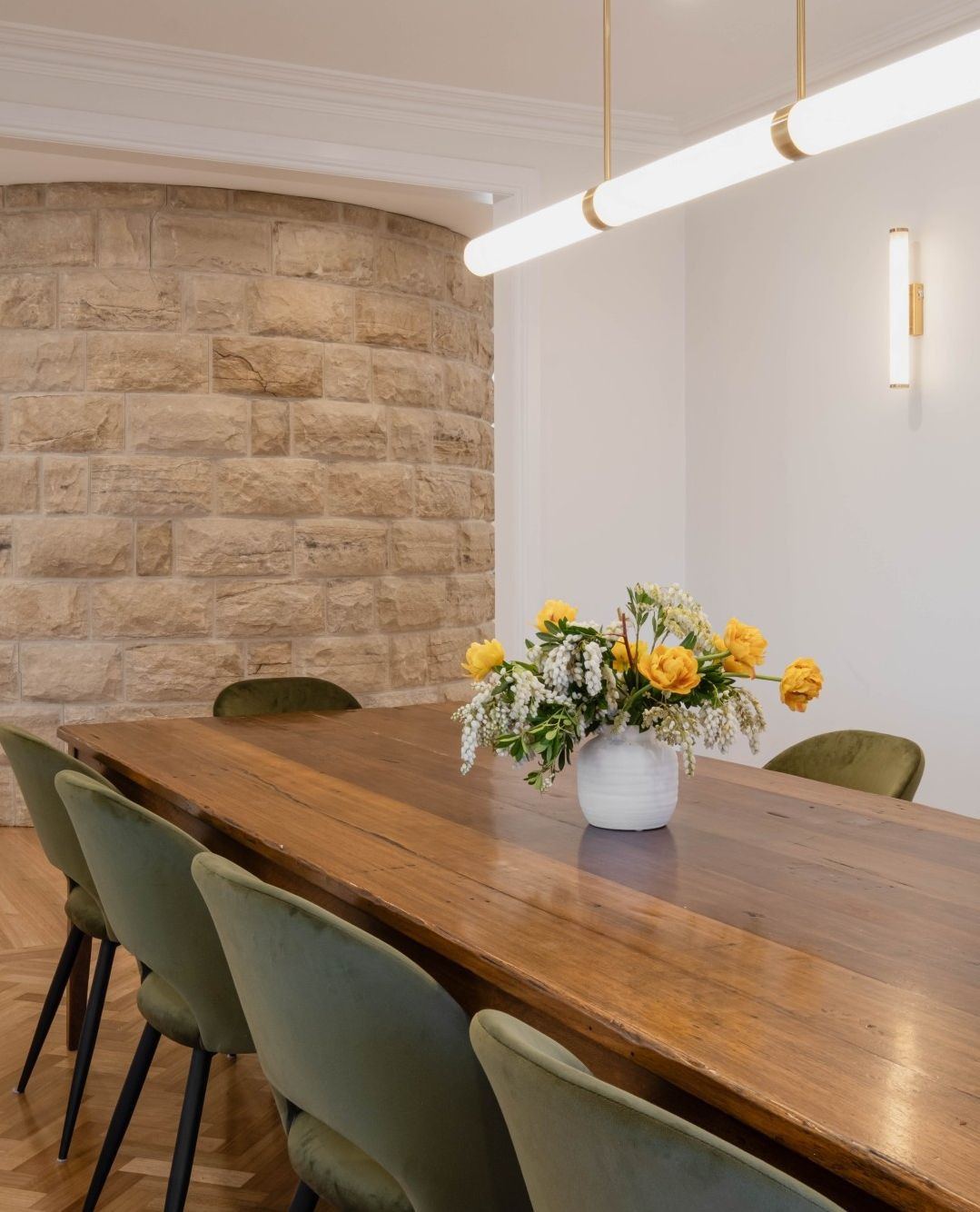 When we were invited to modernise our client's new home, our priority was to retain the dramatic stone wall feature, while creating a surrounding colour and material palette that provided harmonious contrast to the natural material.
We love the way the rugged earthy stone contrasts with the traditional herringbone flooring, elegant brass light fitting and soft suede dining chairs.
==========
🔨 Wolf and Willow Projects: Builder & Carpenter specialising in home renovations, kitchens, bathrooms and outdoor living spaces in the Byron Bay, Hinterland and Northern Rivers region.