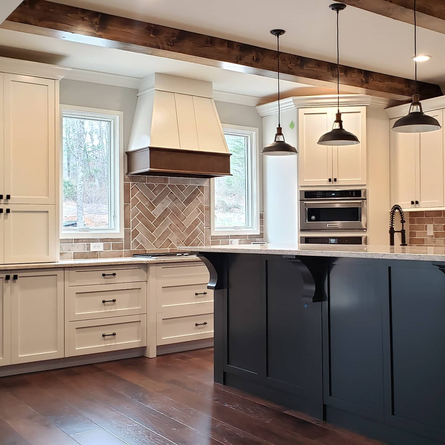 We love kitchen designs that are made specific to meet the needs of our customers. This was meticulously designed and the finished product is beautiful!
#customhome
#customehomebuilder
#jontotherowconstruction
#kitchen
#beams
#customhood
#whitekitchen
#blackisland
#customcabinets
