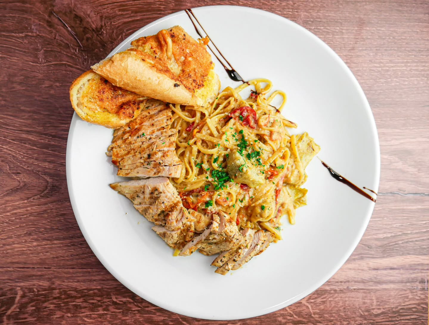 Savor the perfect blend of flavors with our Chicken Linguine 🍝✨ Tender grilled chicken, artichoke hearts, and roasted tomatoes tossed in a creamy sun-dried tomato pesto sauce. Every bite is pure comfort!
📍 Visit us today and taste the magic.
#ChickenLinguine #PastaLovers #ItalianCuisine #FoodieFavorites #ComfortFood GrilledChicken FoodieGram