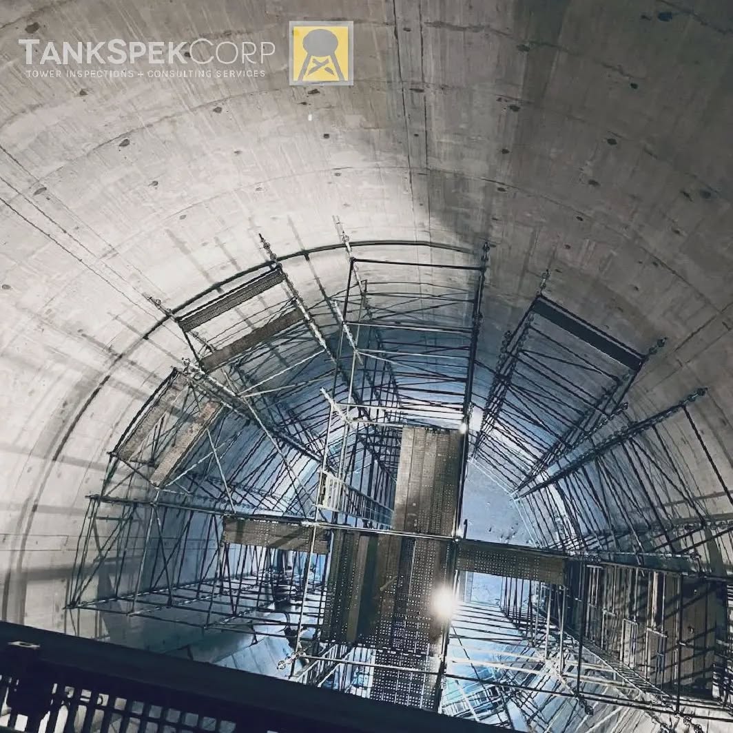 This is the view of the inside of a modern water tower. This particular tower is called a composite pedestal, and it's the kind you've seen having a painted tank elevated on top of a concrete column. As you see here, no water is stored inside the concrete column, only in the tank above. While on site for some FAA lighting installations, our crew observed this scaffolding being installed by a telecom company. The scaffolding was for access to drill three anchoring breaches along the upper, concrete pedestal in order to install telecom receivers to the pedestal 's exterior surface. It is always interesting to see how crews who aren't in the tower/extreme-access industry work around extreme-access obstacles. Usually by conventional methods (anything one can rent at @homedepot ) often creating avoidable labor cost and potential safety hazards.
@harken_safetyandrescue @priority1safet
Photo credit @swampgumpharpy