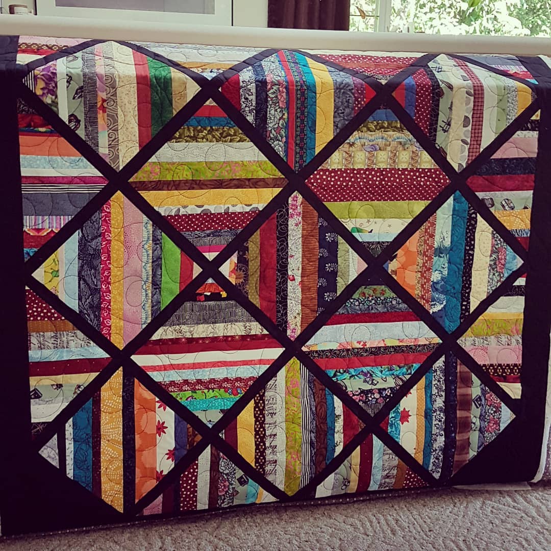 I'm a huge fan of scrappy quilts!! While I've only made a couple of my own, I've quilted many for my clients. I love how fabrics you would never put side by side in a traditional quilt just seem to work together in a scrappy. This quilt that Bonnie B. has created has inspired me to grab all those left over strips I've been saving and create a scrappy quilt of my own!
#quiltingismypassion #mistymountainstudio #longarmquilter #quiltersinvictoriabc #quiltersofinstagram #canadianquilter #apqsmillie30 #quiltpath #scrappyquilts #quilting #quiltersgottaquilt #thebatikplace #onlinefabricstore #mistymountainvictoriadotcom