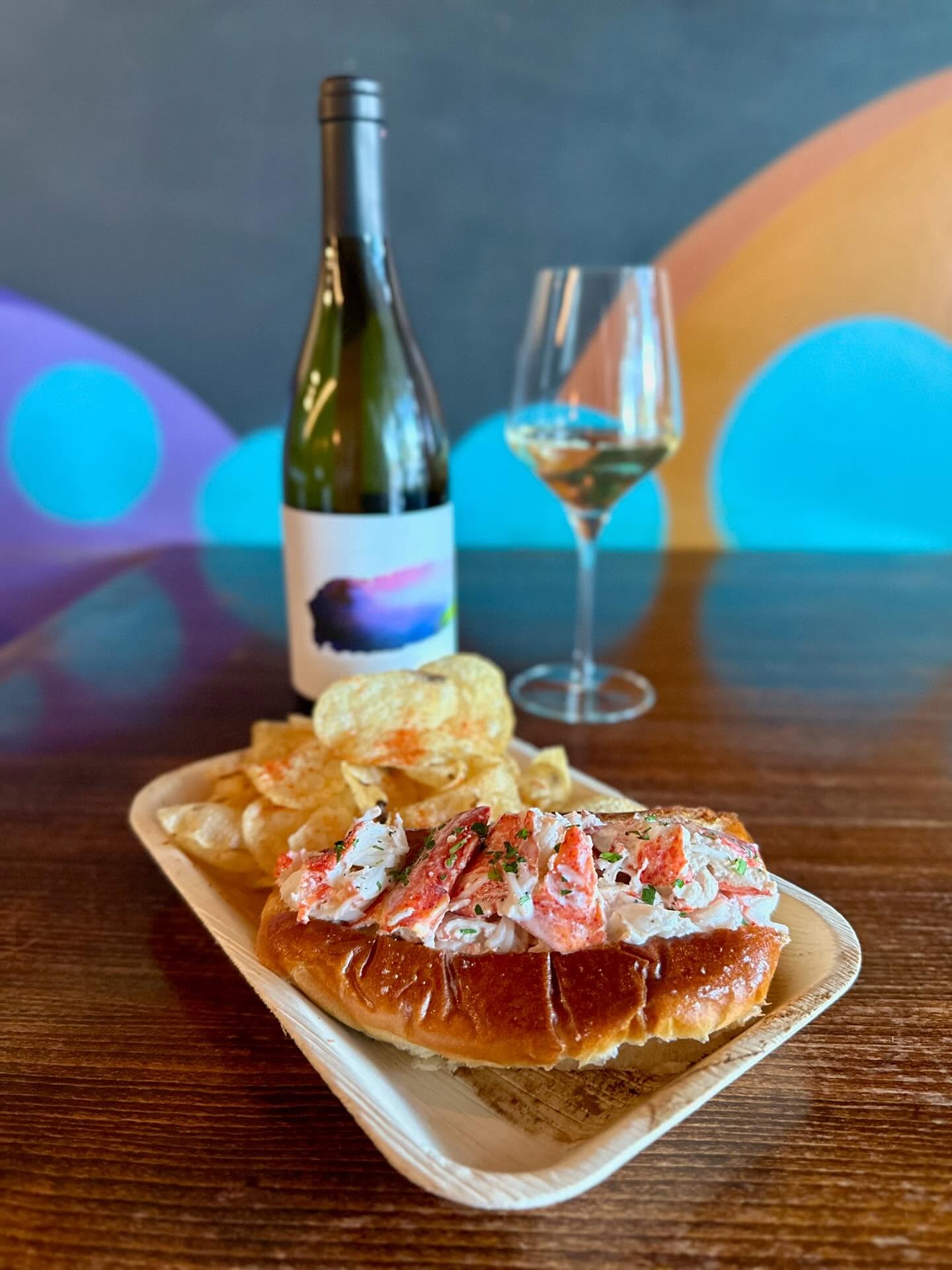Lunchtime just got a little more coastal 🦞 Our lobster roll is on the menu and is perfect with a crisp glass of wine. Come grab one for lunch!