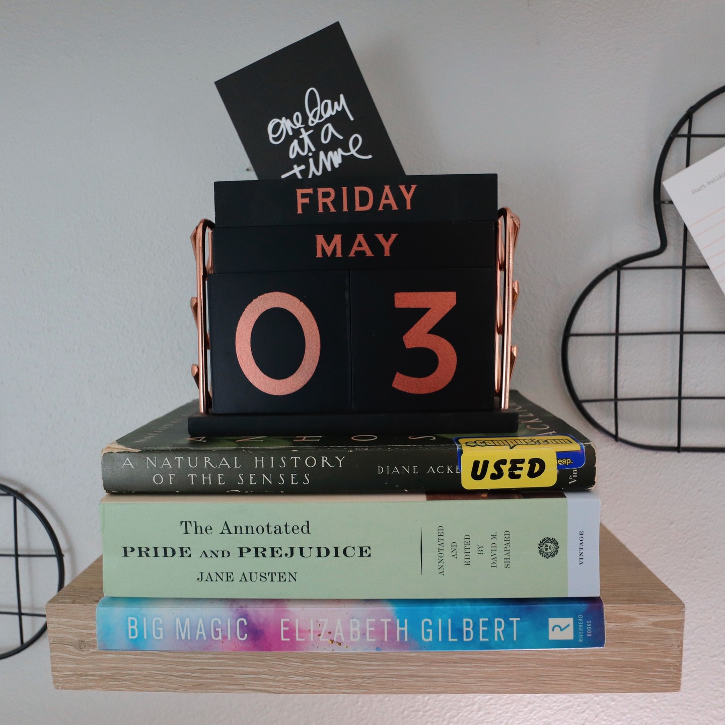 During my little writing hiatus, I've collected some books.
It's been tough letting my first draft sit sad and lonely in its folder. I'm absolutely dying to get back to it (and plan to do just that tomorrow!), but I have been looking through some nonfiction books in the meantime.
"Big Magic" has been on my TBR for probably a decade and this quarter's Drafting Club picked it for the craft book study. My copy came in the other day and I'm looking forward to reading through it and chatting about it.
"The Annotated Pride and Prejudice" is a really fun read for anyone with an interest in the history beyond the fictional world of Rosings Park, Netherfield, Brighton, etc. You get one page of the P&P text and the facing page contains all sorts of little factoids about customs of the time, historical influences on Jane Austen, or just quick definitions of what a word or phrase means.
"A Natural History of the Sense" was recommended in another book I read recently and I decided to pick it up. I'm only about 15 pages in so far, but WOW. It's beautifully written and is getting me thinking more and more about how to use sensory language in my writing.
What nonfiction have you been reading lately?
#amwriting #amreading #writingcraft #writingcraftbooks #bigmagic #historyofthesenses #prideandprejudice