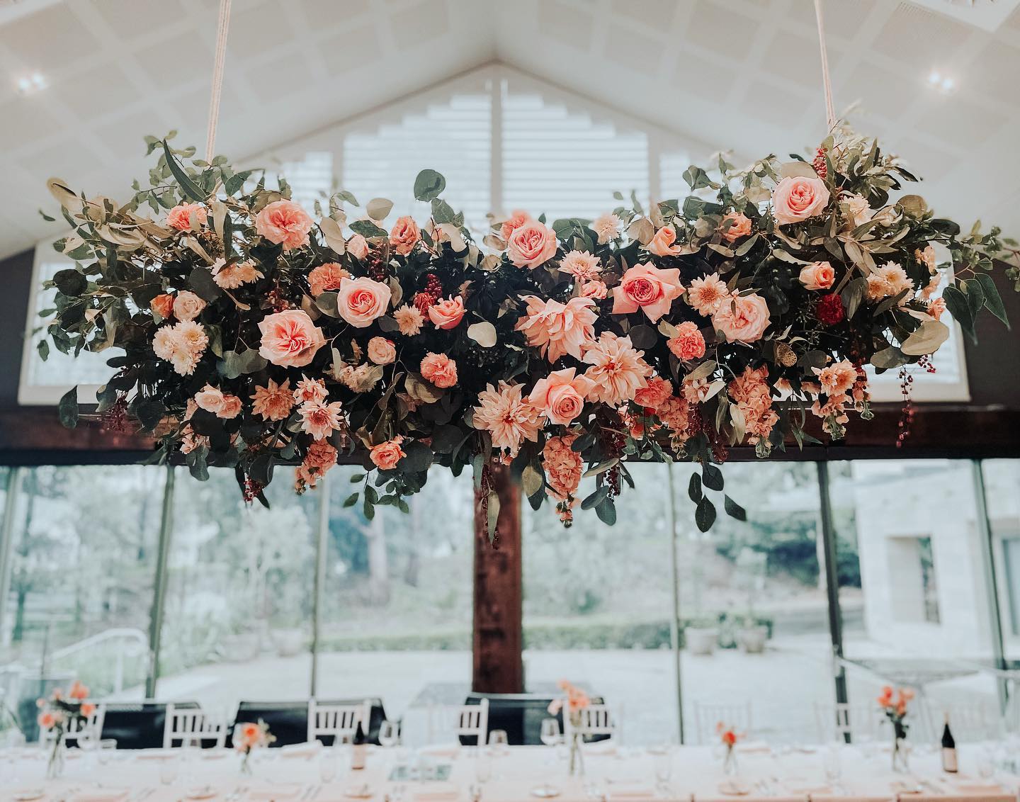 Reception ready for Manuela & Ray 💫 @deckhousewoolwich #hangingflorals #sydneyweddingflorist #flowerinstallation