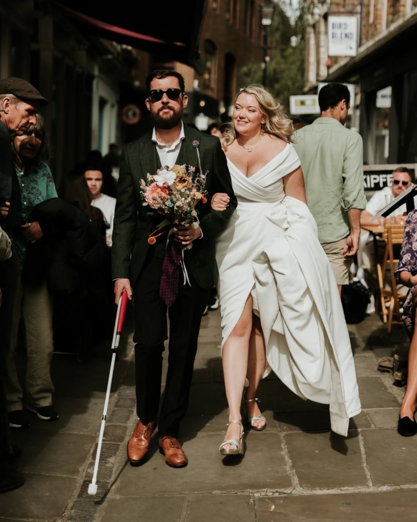 Lucy & Alex and their wander through Camden Passage after their @sayidoislington London wedding.