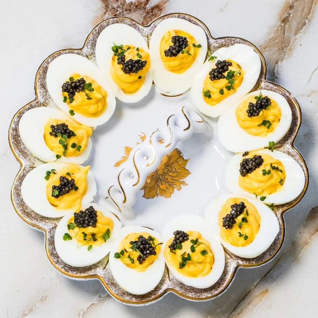 Eggs... As every year, they will be extremely popular on most Easter tables. Bored with a traditional version with mayonnaise? Try caviar-topped deviled eggs. They not only look good but also taste amazing!
.
.
.
.
#antoniuscaviar #easter #eggsforbreakfast #caviareggs #easterbreakfast #eggwithcaviar #easterrecipes #eggs #breakfasttime #caviarblack #caviarlover #caviartasting #eastertable #easteregg #caviar #polishcaviar #caviarlover