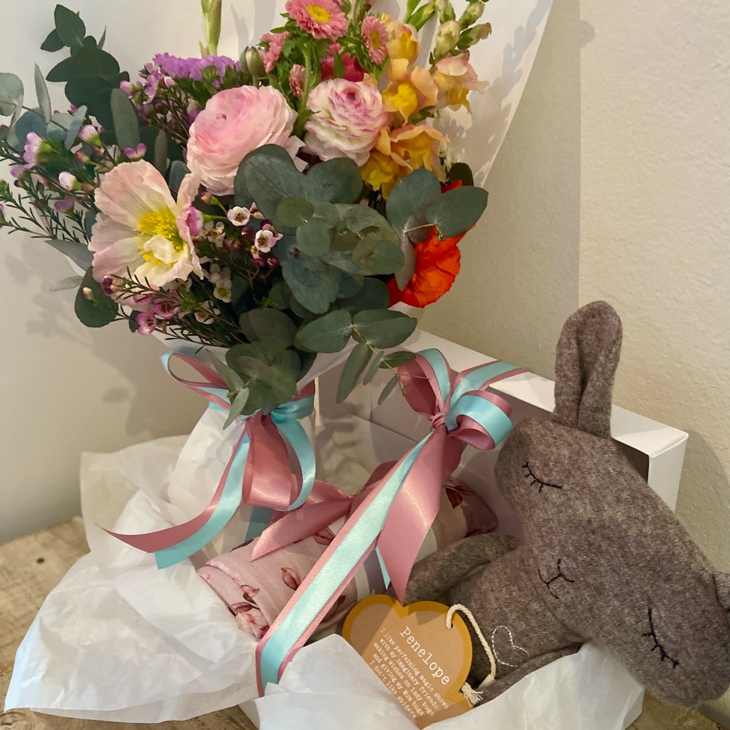 Beautiful hamper for a new Baby and Mum! The Petite Fleur Hamper contains a fresh flower posy and Snuggle Hunny Organic Muslin wrap and Baby Milestone Cards. For this order a cute little rabbit was added from and The Little Dog Laughed collection. Order on the website: https://www.thecuriousrabbitflowershop.com.au/ #thecuriousrabbitflowershop #balmainflorist #innerwestflorist #flowerdeliverybalmain #rozelleflorist #lanecoveflorist #flowerdeliverysydney #babygiftideas