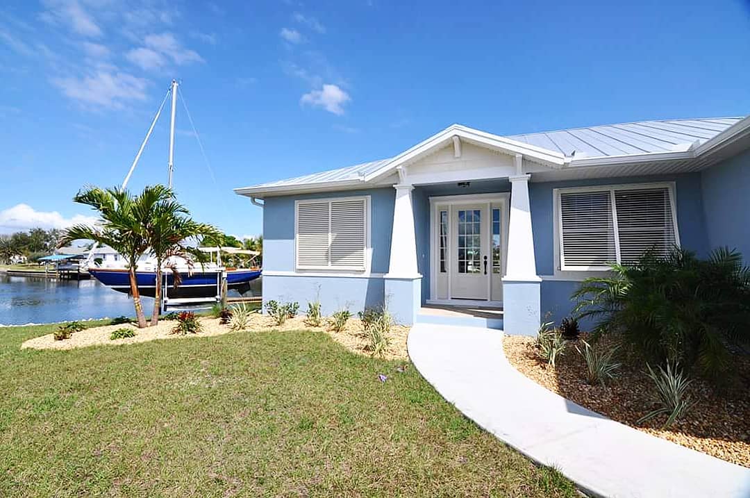 #ThrowbackThursday to this custom craftsman style home we built on the water in #PuntaGordaFL โต
.
.
.
.
#qualityhomesofpc #qualitybuilt #craftsmanstylehome #customhome #sailboatlot #floridaliving #swfl #floridahome #homeinspo