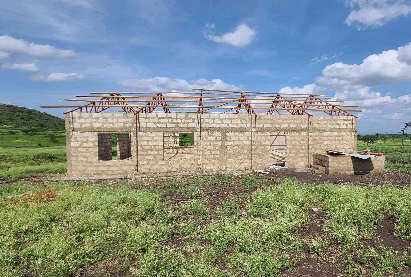 Inspite of the strong winds that blew the roof and parts of the walls down and the fact that it is rainy season here which caused construction to stop, the walls are rebuilt and the trusses are replaced!
•
We have to purchase a few extra pices of tin and pay for a week or two of extra work days, so this church will cost us a little more than the first, but all in all things are going well and the building will be done in about a month.
•
#Moshi #Kilimanjaro #Tanzania #RiftValley #Maasai #Africa #GodsWell #Moita #Kikovu #Construction #Church #Arusha #Missions #Support #Money #Give #Kilimanjaro