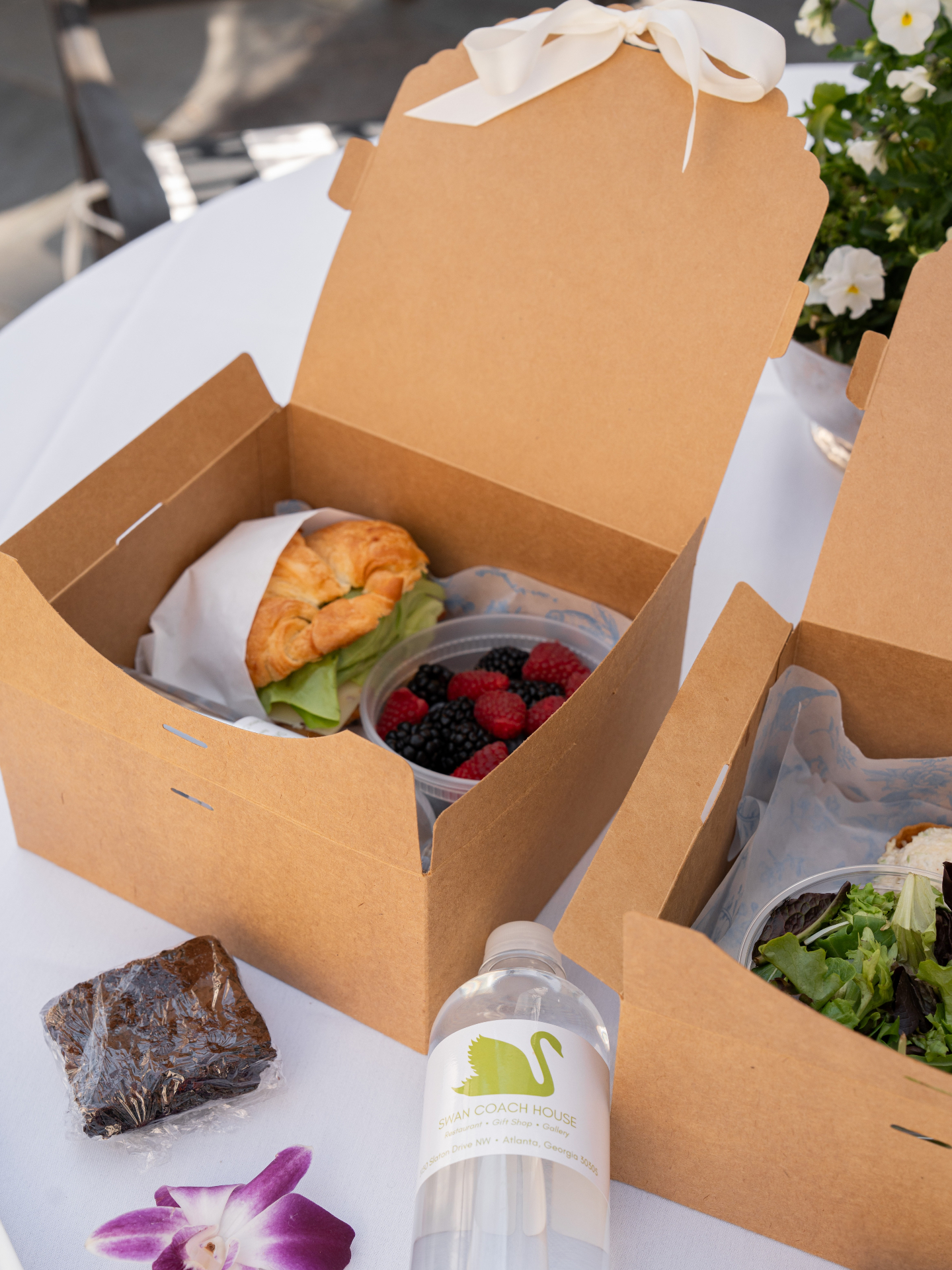 Hosting a meeting, luncheon, or group gathering? Our boxed lunches are an easy win.
With options like the Swan’s Favorite, Turkey & Ham Croissant, Grilled Chicken Sandwich, and Southern Fried Green Tomato BLT, there’s something for everyone. Each box includes salad greens, fresh fruit, a water bottle, and dessert.
$18 per box | Minimum of 10! Head to the link in our bio to view the full catering menu, and place your order!