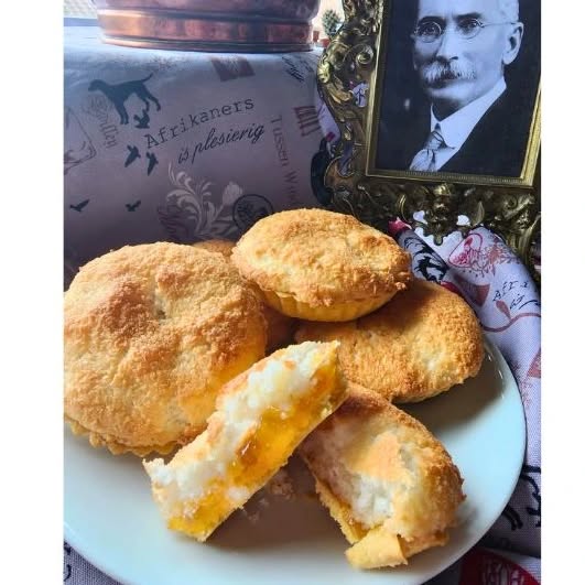 Hertzoggies
Hertzoggies are a type of South African pastry that is named after J.B.M. Hertzog, a former Prime Minister of South Africa. The pastry consists of a shortcrust pastry shell filled with a mixture of apricot jam and ground almonds, topped with a coconut meringue. The meringue is made by beating egg whites and sugar until stiff peaks form, then folding in desiccated coconut.
Hertzoggies are a popular sweet treat in South Africa, often served at tea time or as a dessert. They are also commonly found in bakeries and cafes throughout the country. The combination of sweet apricot jam, nutty almond filling, and fluffy coconut meringue makes for a delicious and indulgent pastry that is enjoyed by many.
