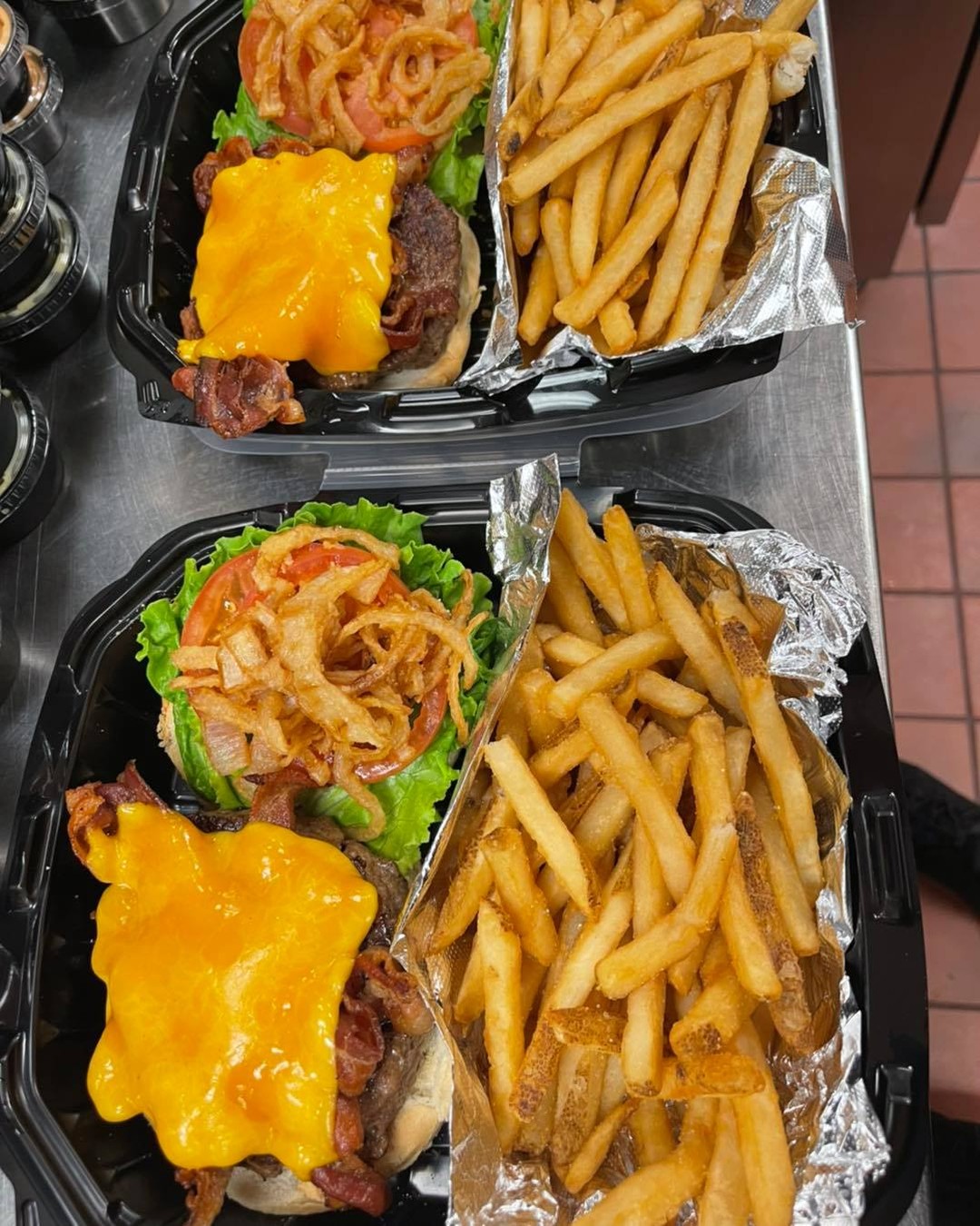 Order up for Curbside! Bacon Cheddar Burgers with Lettuce, Tomato, Fried Onions and BBQ Sauce on the Side! Cheers!