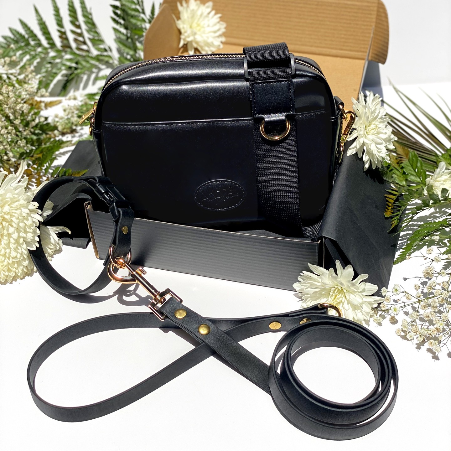 Elevate your dog walking game with our new dog walking bag, made from faux leather and gold hardware. Complete the look with our matching collar and leash for the ultimate classic and elegant style. All our collars and leashes are handmade to order. 🐾✨ #AdonisBarks #DogWalkingInStyle #ElegantPets #ClassicCanineStyle #dog #dogwalkingbag #dogs #dogaccessories