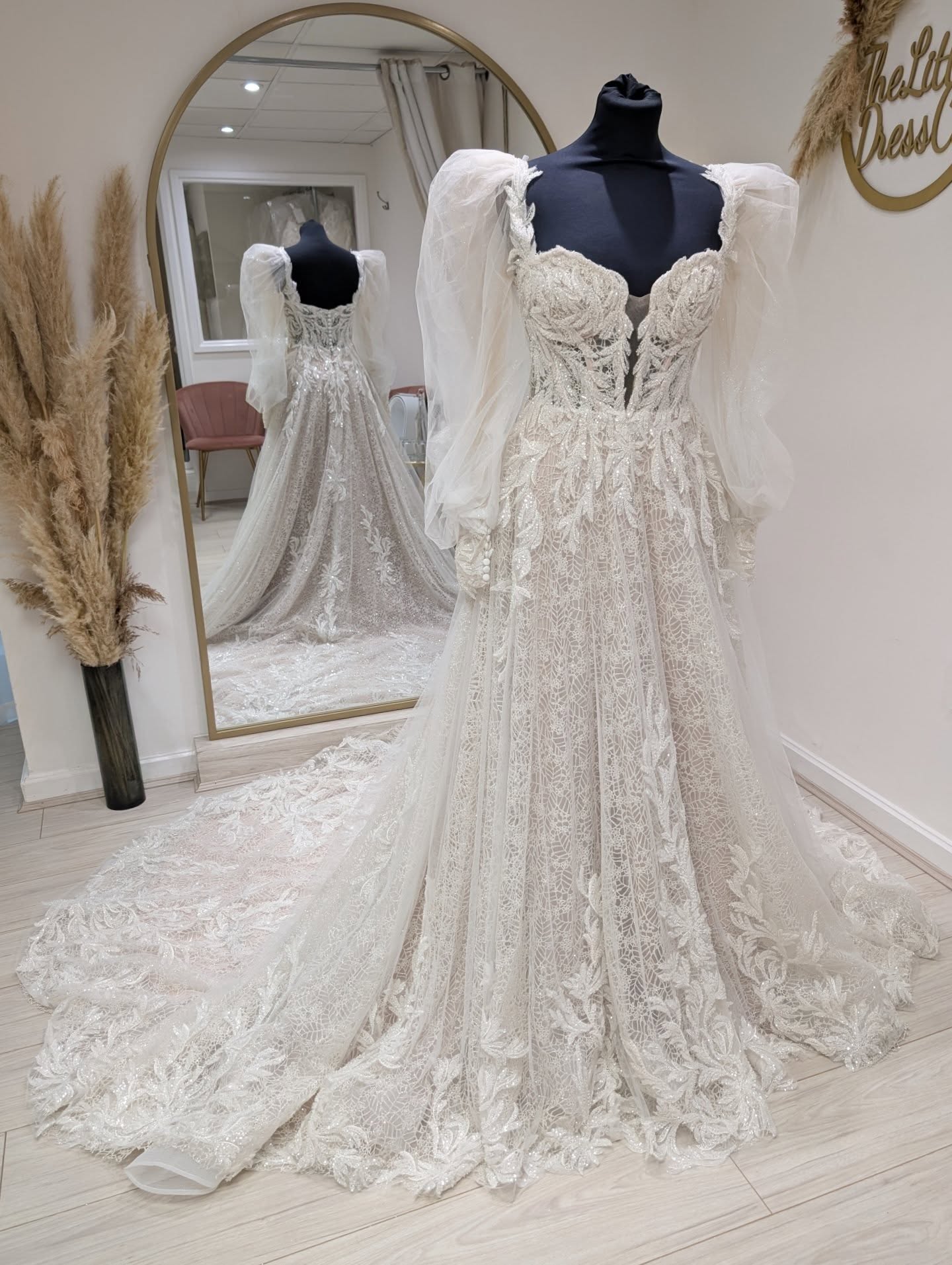 💕 With sleeves, or without? 😍 This gown is a true showstopper with all over sparkle detail and detachable statement sleeves for 2 looks in 1! ✨