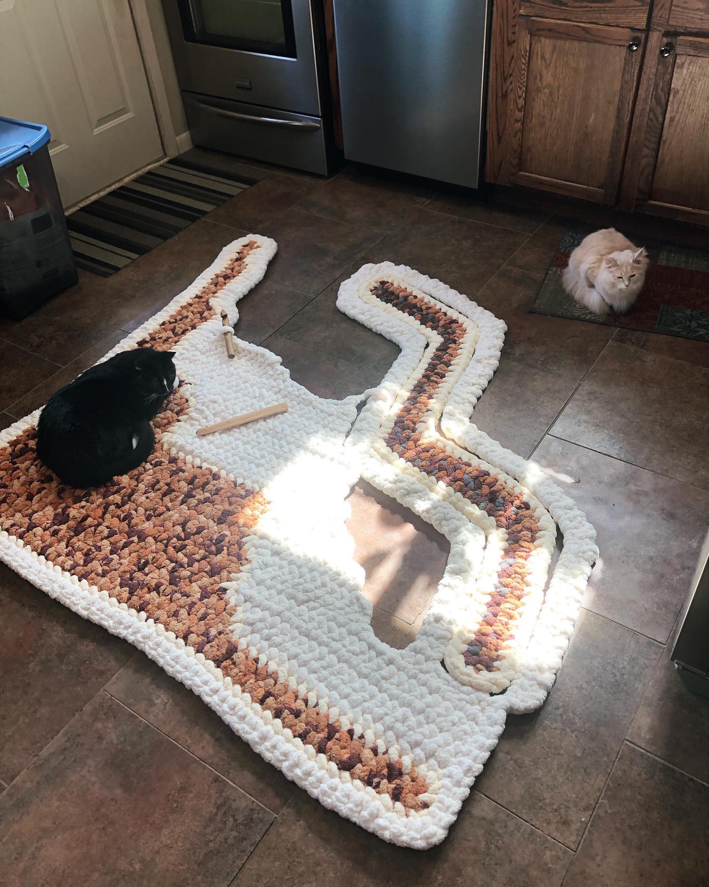 Hardest part about working on this things at home #cats #handmade #blanket