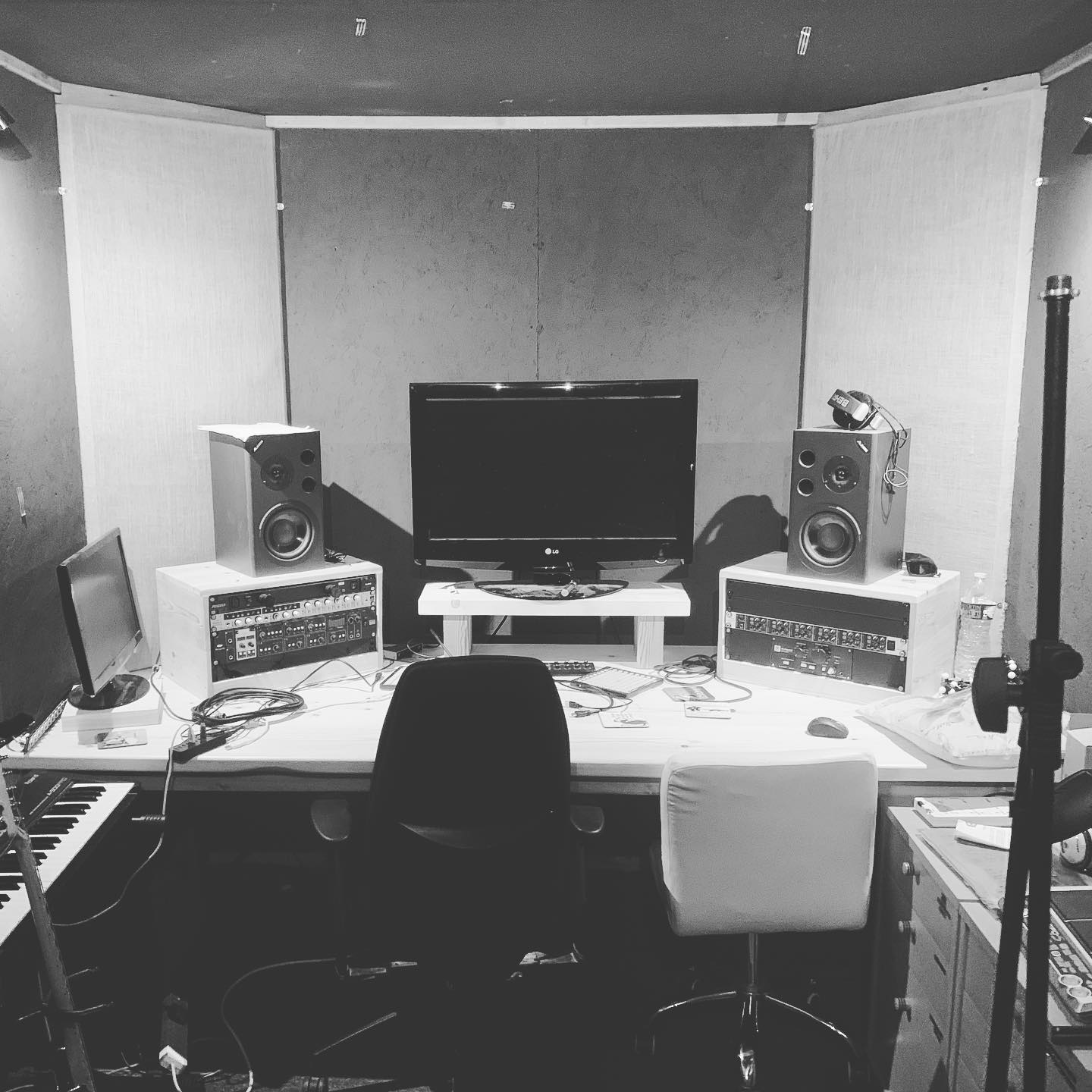 Measuring for acoustic panels - mirror and tape at the ready