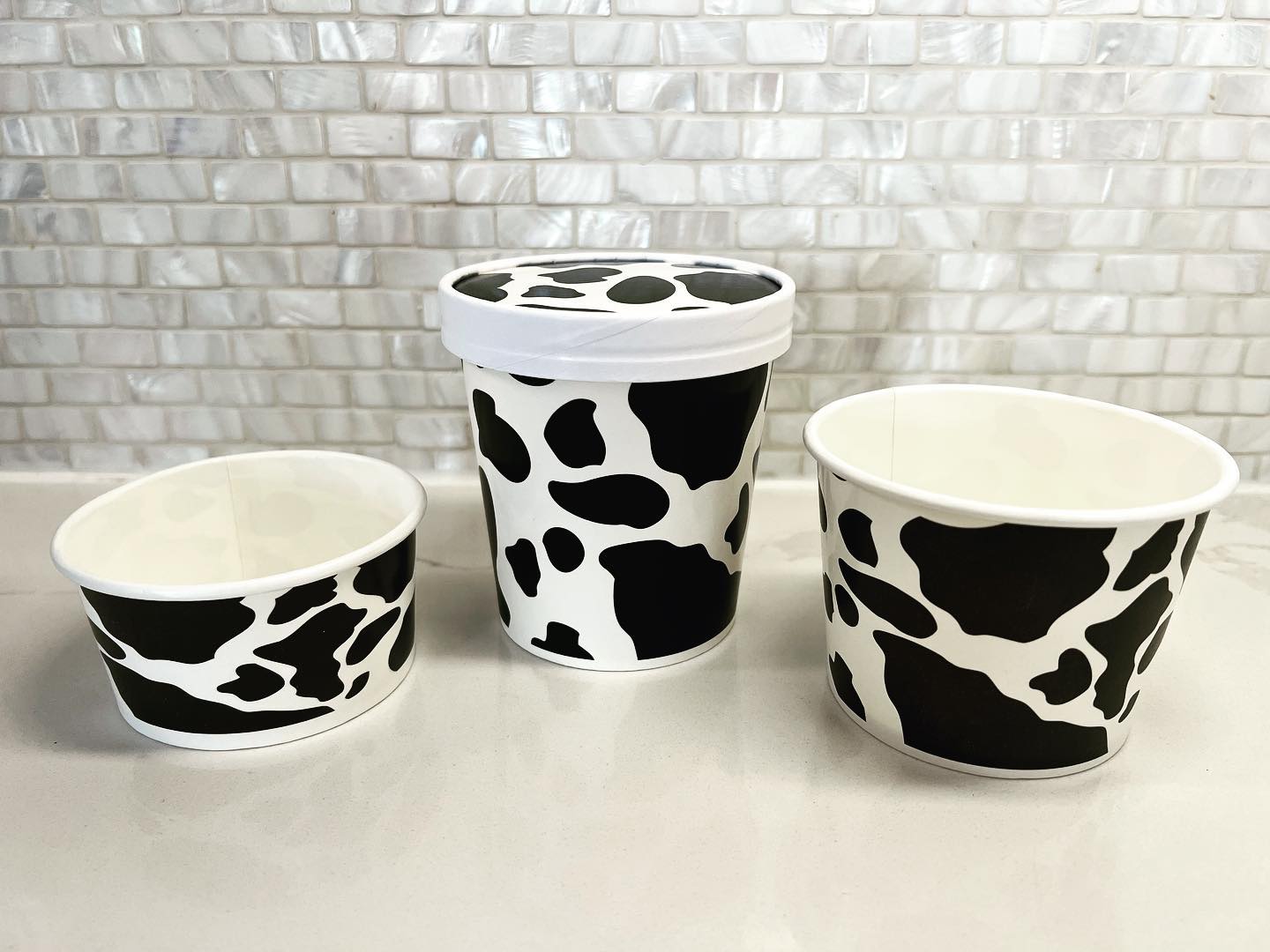 What makes #boozy #icecream even better? Eating it from a cow print cup! Stay tuned for our opening date! @freshandlocalmarketandkitchens