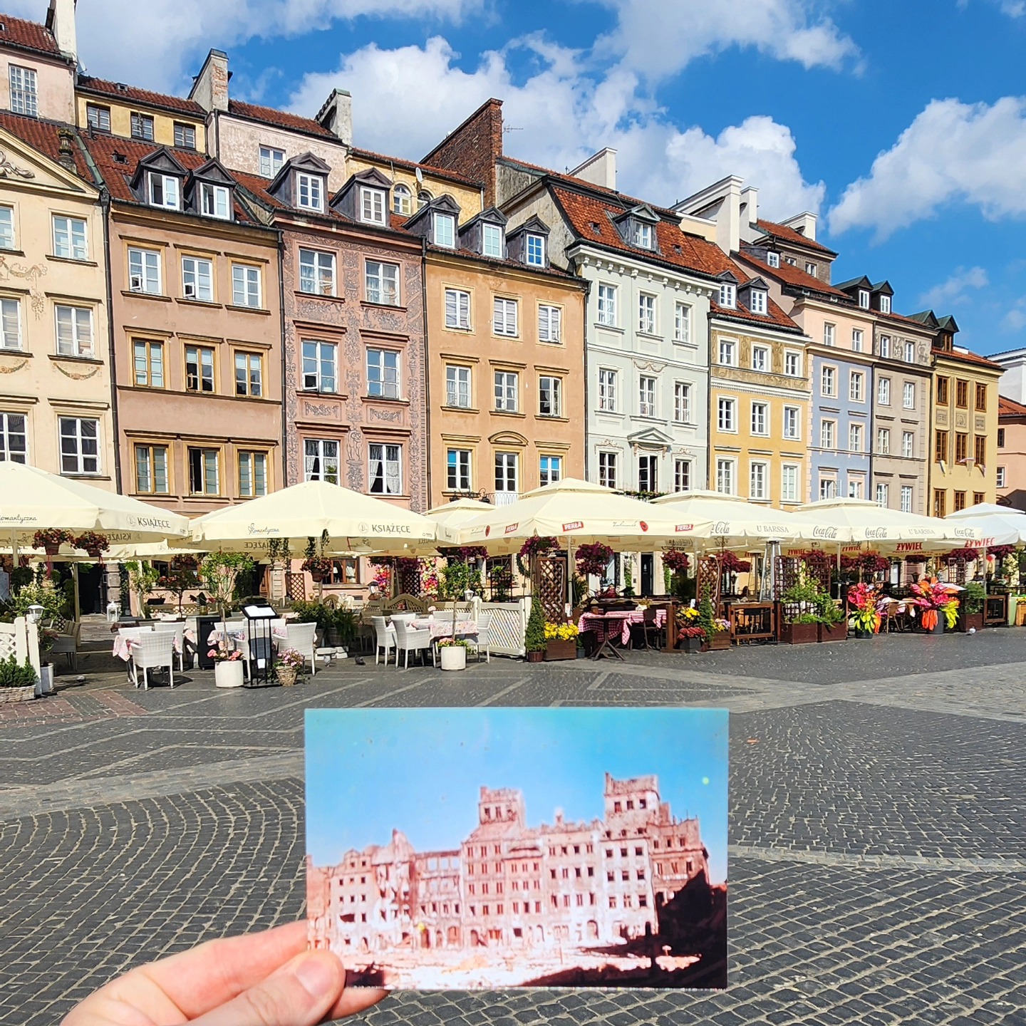This was in Old Town Market Place in Old Town (Stare Miasto) in Warsaw. I'm holding a photo of the exact spot where it was being destroyed in August 1944 during the Uprising. Standing in today's beauty and peace.
.
.
#Warsaw #Poland #travel