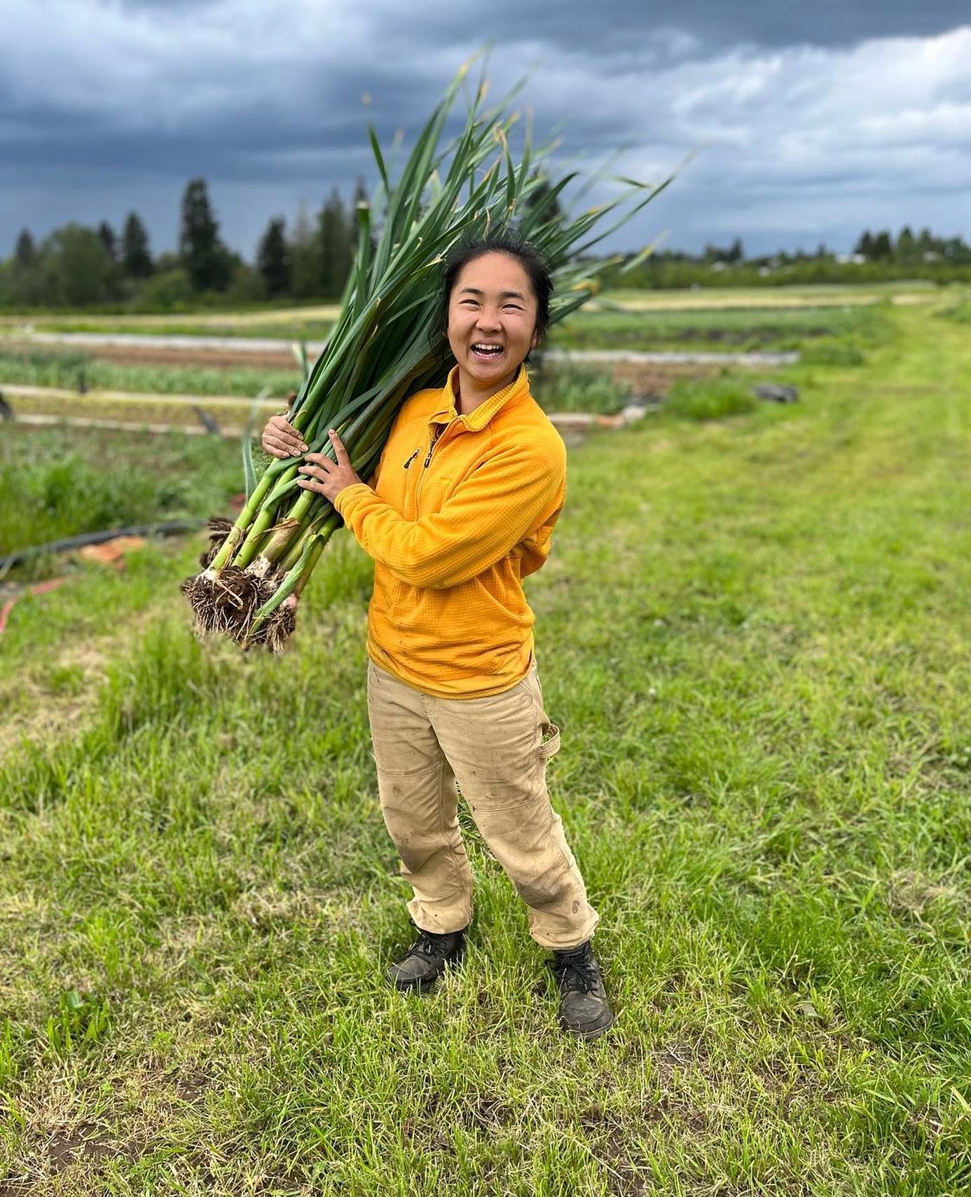 The 230th recipient is Catherine Nguyen of Mora Mora Farm @moramorafarm in Gresham, OR.
Catherine writes, “I began farming as a way to slow down. My first experience was volunteering on a small farm in my college town, and it wasn’t long before I was hooked. More than anything, I loved the type of labor that it was - pulling me into my body and settling my thoughts. Anyone who knows me knows that I really value making space for quietness. Farming, for me, affords me that opportunity.
Looking back, farming started more as an escape from my hectic schedule (c’mon…you have to appreciate the irony of that :). But now, farming feels like the real-est thing I do. It somehow is able to hold the tension of opposing values and skill sets. It’s both solitary work and community work. It requires both patience and decisiveness, flexibility and a plan. It is hilariously ordinary at times and yet, still the most profound thing I think I'll ever do. Farming is beautiful to me because it holds these multitudes.
Self-care, for me, looks like cultivating balance. To remind myself that there are always two sides. Work must be balanced with rest. Community engagement must be balanced with self-reflection. Aphids with ladybugs, voles with snakes. A sense of drive with a sense of peace. For me, life has been the most remarkable when I'm floating somewhere between the tension of things.”
#moramorafarm #realfarmercare