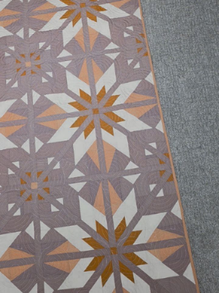 We're one week away from the release of my new quilt pattern, Sweet Creek, and it's about time I show you a little looksie at the cover quilt! Somehow I managed to take absolutely no in-progress photos, so we're jumping right to the full thing!
The design is inspired by one of my family's favorite hiking trails in a local national forest. It follows a river while winding through the woods, and you're greeted by a waterfall at the end. There are lots of smaller waterfalls along the way and we love finding a spot by one of them where we can wade and splash around in the warm water.
The design features a star within a star and the secondary design in the corners reminds me of the dappled light shining through the trees along the trail and the sparkling water of the creek. It really is a magical place.
I can't help but think of all the families who are separated, scared, and hurting right now, which is such a juxtaposition to the imagery I just described. I'll be donating a portion of my pattern sales to CANMN, which is a community aid network in MN that started during COVID and still provides food, diapers, and everyday supplies to community members 🤍
Pattern: Sweet Creek quilt pattern by me coming Thursday, Feb 5th!
Fabric: @artgalleryfabrics
Amazing longarming by Ligia of @dearlyquilted using the raindrops on water panto by @threesistersquilt
#sweetcreekquilt #heckyessewco #heckyespatterns