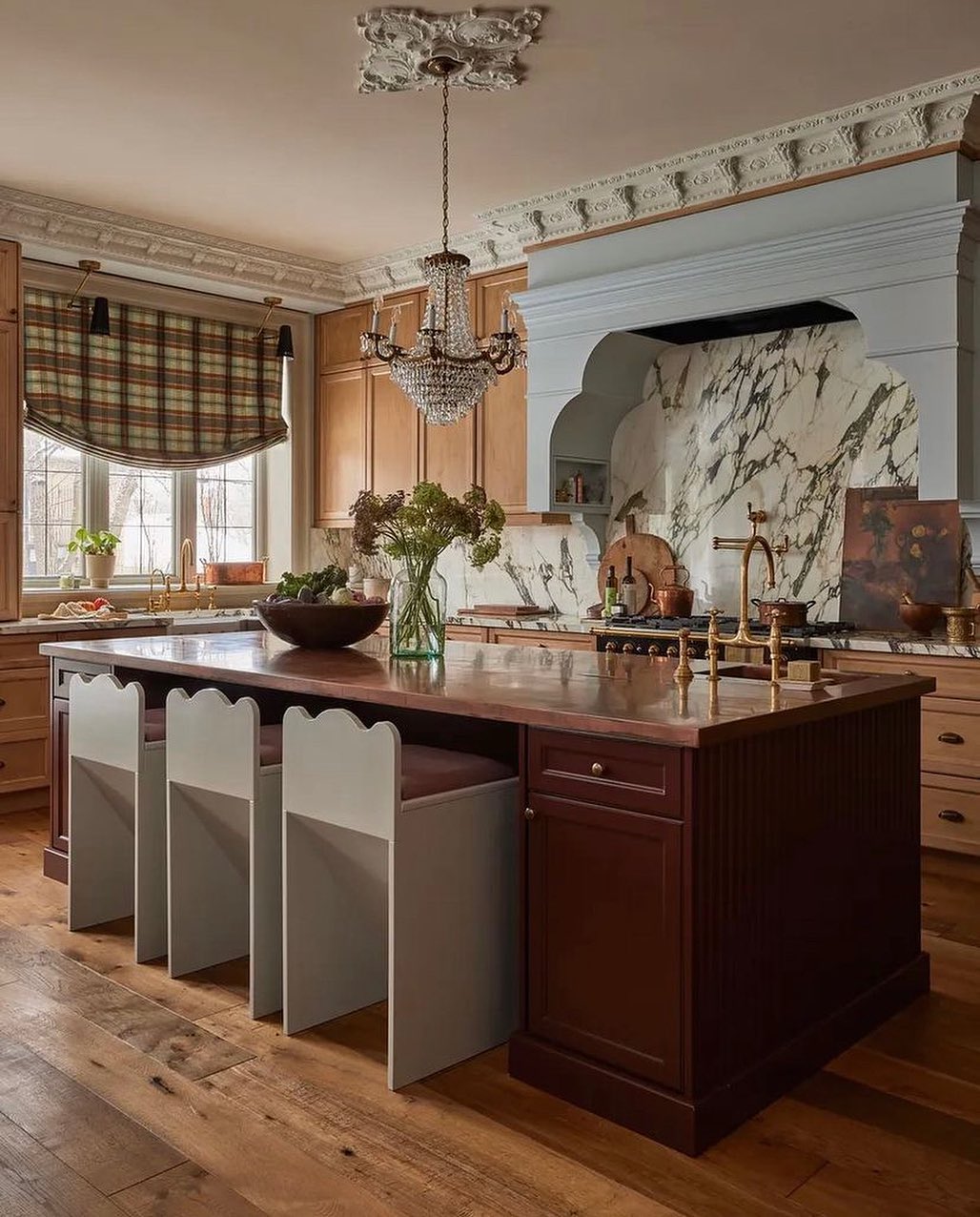 This GORGEOUS kitchen holds many design trends we think will shine in 2023. Let’s elaborate…
1. LATE 70’s, EARLY 80’s vibes. Check out the plaid fabric window treatment. The warm color palettes, patterns, and post-modern furniture wave are going to hold steady this year.
2. RED - This color is going to be popping up everywhere in a slow burn way. Deep burgundy, copper, and oxblood are going to be hot this year.
3. SCALLOPED DETAILS - The feminine scallop pattern will be seen in furniture. Love the mix of the soft scallop with a structured, clean-lined base in these counter stools.
4. DRAMATIC MARBLE - Calacatta Viola is making a gorgeous statement with the deep red and brown veining.
5. NATURAL WOOD TONES - Beautiful, natural wood is never out of style
6. PASTELS - We are heading away from neutrals taking over, and are stepping back towards color. Loving the blue pastel pop in this kitchen.
7. INTRICATE DETAILS - Bespoke design focuses on the small details that make big impacts. The beautiful millwork and moulding seen here draws you in. Look at the details of the vent hood 🤩
8. ECLECTIC STYLE - 2023 is the year to be you, and let your style shine. The trend is ironically to not follow any trends, but go with what truly makes your heart sing!!
Those are just a few design trends we will be seeing this year. What’s your favorite?
Photo/Design by @ashleymontgomerydesign
#2023designtrends #design #interiordesign #interiordesigntrends