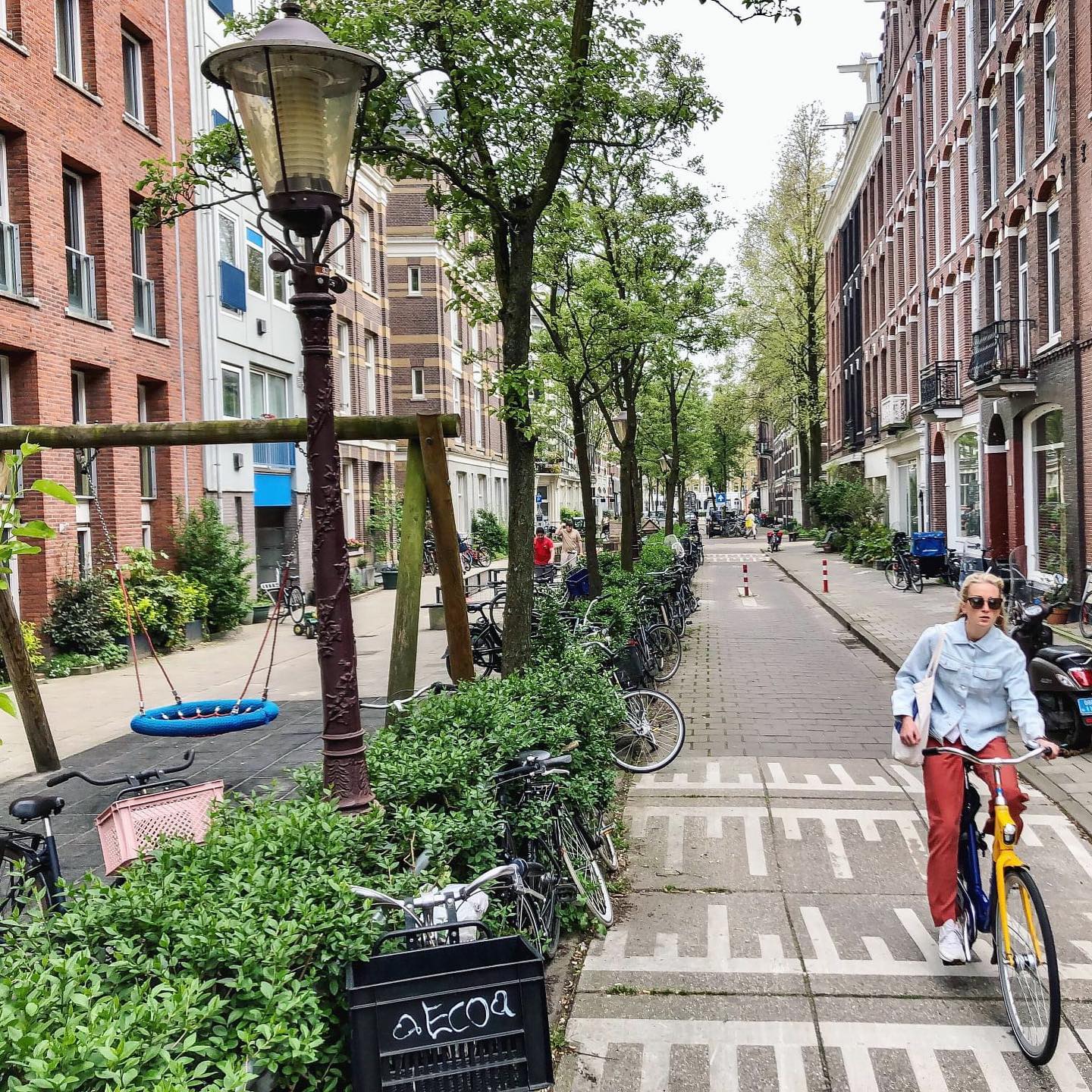 Wouldn’t it be wonderful if every street was designed to prioritise the needs of playing children! 🛴🛼🛝
This is a beautiful example of a street in Amsterdam which integrates a space for play on the doorstep of an apartment building. The play space is made welcoming and safe through the integration of planting and trees, spaces to rest, traffic calming measures and by prioritising the movement of cyclists and pedestrians over cars.
As noted by Melissa and Chris Bruntlett (Authors of Curbing Traffic)
"Having fewer cars in our lives brings obvious and not-so-obvious benefits to each member of our family, from lower exposure to air and noise pollution, to reduction of chronic stress, an increase in physical activity and feelings of social connectivity."
Photo by: Melissa and Chris Brutlett
Location: Amsterdam
.
.
.
#citiesforplay #playfulcity #childfriendlycity #play #learningthroughplay #urbandesign #placemaking #publicspace #urbanplanning #citymaking #urbanchildhoods #citylife #urbanista #planning #citylab #citiesforpeople #playmatters
