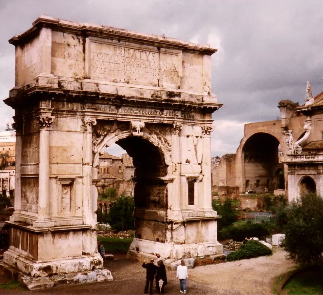 The Arch of Titus with the Basilica of Maxentius in the background. #flashback
