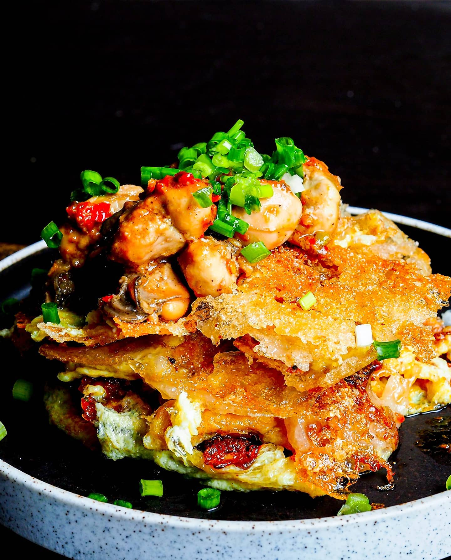 I love my Orh Jian crispy! How about you?
Just few simple ingredients and you can have a better-than-most-hawker orh jian at home.
Step by step pictorial recipe and detailed recipe link in bio or Google eckitchensg orh jian
🔹️
🔹️
Batter Mixture
1 tablespoon Rice Flour
2 tablespoon Sweet Potato Flour
135 ml water at room temperature (about 9 tablespoons)
½ teaspoon Fish Sauce
Dash of Grounded White Pepper
½ teaspoon Hua Tiao Wine
🔹️
Egg mixture
1 Egg
½ teaspoon fish sauce
½ teaspoon Hua Tiao Wine
Dash of Grounded White Pepper
🔹️
Marinating the Oysters
100g of Oysters (Abt 10 pcs)
1 tablespoon chopped garlic
½ teaspoon Fish Sauce
1 tablespoon Hua Tiao Wine
Chili paste to taste (optional)
🔹️
Others
2 tablespoons of oil or more
chopped spring onions for garnishing
#covidrecipes #stayhomeactivities #stayhomerecipe #recipeideas #dinnerideas
#recipe #foodguide #singaporefood #singaporeinsiders #sgfoodies #sgeatsout #foodsg #sgrestaurant #foodphotography #sgfoodporn #instafoodsg #sgfoodie #burpplesg #sgmakandiary #sgfood #instafood #foodpics #foodporn #instadelicious #instasg #sgeat #igfood #sgfoodstagram #hawkersg
#orhjian