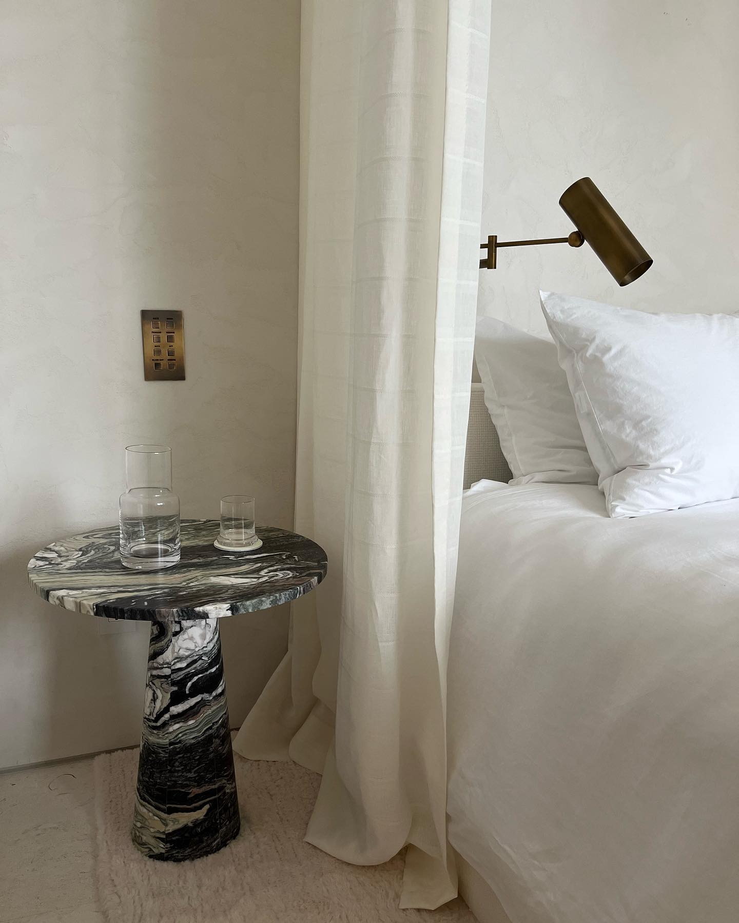 A little snippet of our latest project in Surfside. Was it too early in the construction punch out for white upholstery and rugs? Why yes. Yes it was. 😰