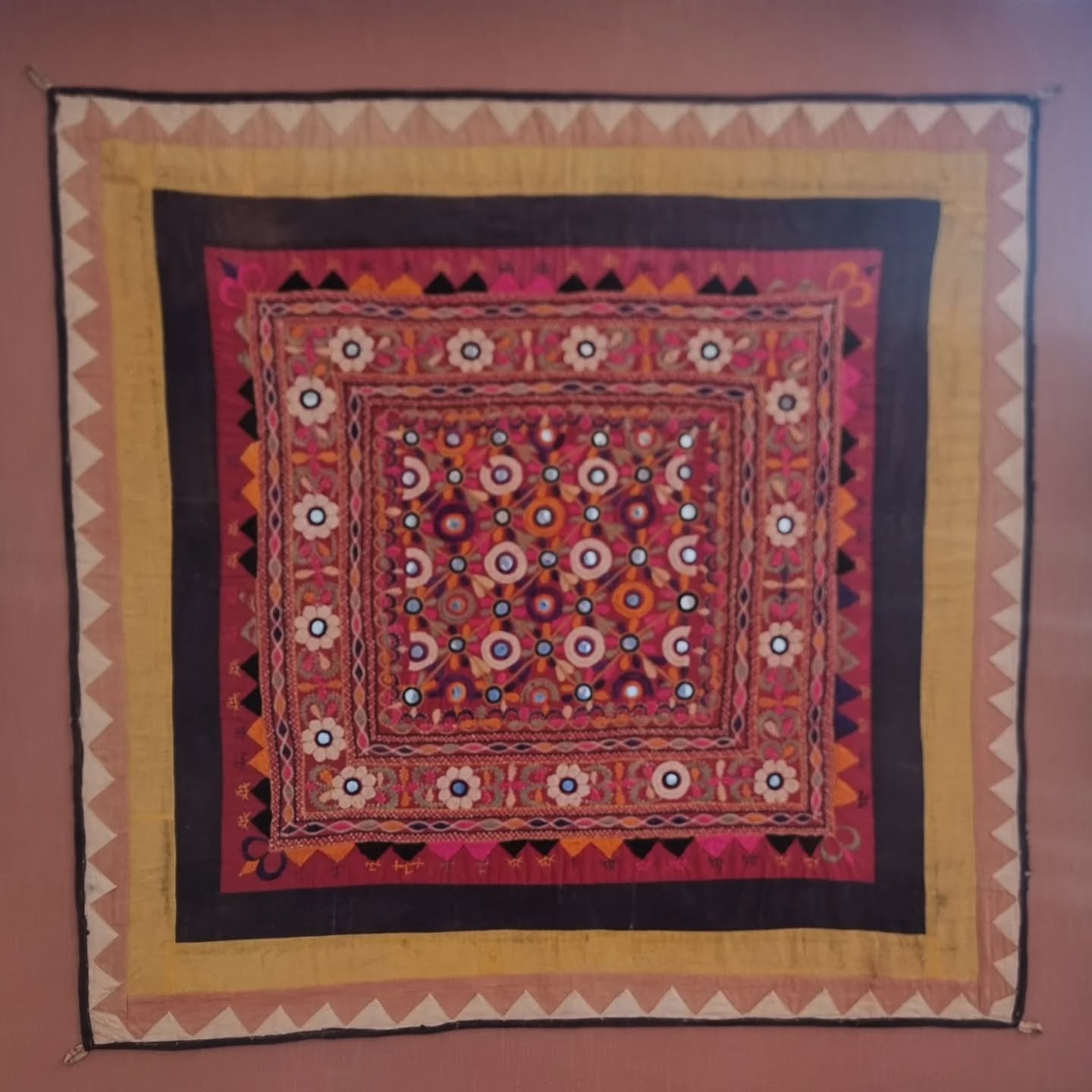 Display preparation of this vibrant Gujarati embroidery. Always good to get your textiles out of the cupboard and up on the wall. Beautiful silk floss floral embroidery.
#textiletraditions
#textileconservation
#indiantextiles
#gujaratiembroidery
#silkembroidery