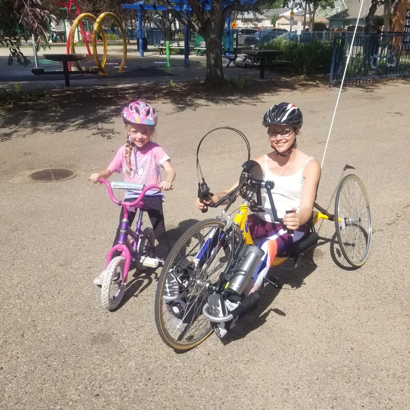 This picture was taken 4 years ago. It was the very first time I ever tried handcycling.
At the time, I had been in a wheelchair for 19 years, and in all those years, I had never attempted cycling.
Why?
Because I was afraid of the transfer from my wheelchair to the cycle and back again.
I had never transferred that far before, and I was afraid that I would not be strong enough to get myself back in my wheelchair from the seat of the handcycle.
I was terrified of embarrassing myself, or worse, proving to myself that I was incapable.
The 2 foot distance between my wheelchair and the handcycle may as well have been Mt. Everest to me.
When I finally got the nerve to try it, I realized that not only was the transfer doable, but that, with enough practice, it was actually easy.
For 19 years I watched my friends and family go cycling without me. I said goodbye to them as they rode away and missed out on all those opportunities to make memories all because of a measly 24 inches.
I realize now that the obstacle was not the distance I needed to transfer, but my limiting belief that I couldn't do it. It was in my head all along.
I could tell you countless more stories about things I missed out on because I was simply too afraid to try.
I can't do anything about the past, but I can choose what kind of future I create. I know that future will still hold a lot of fear, but now, and for every moment I still have left on this earth, I'll feel the fear and I'll do it anyway.