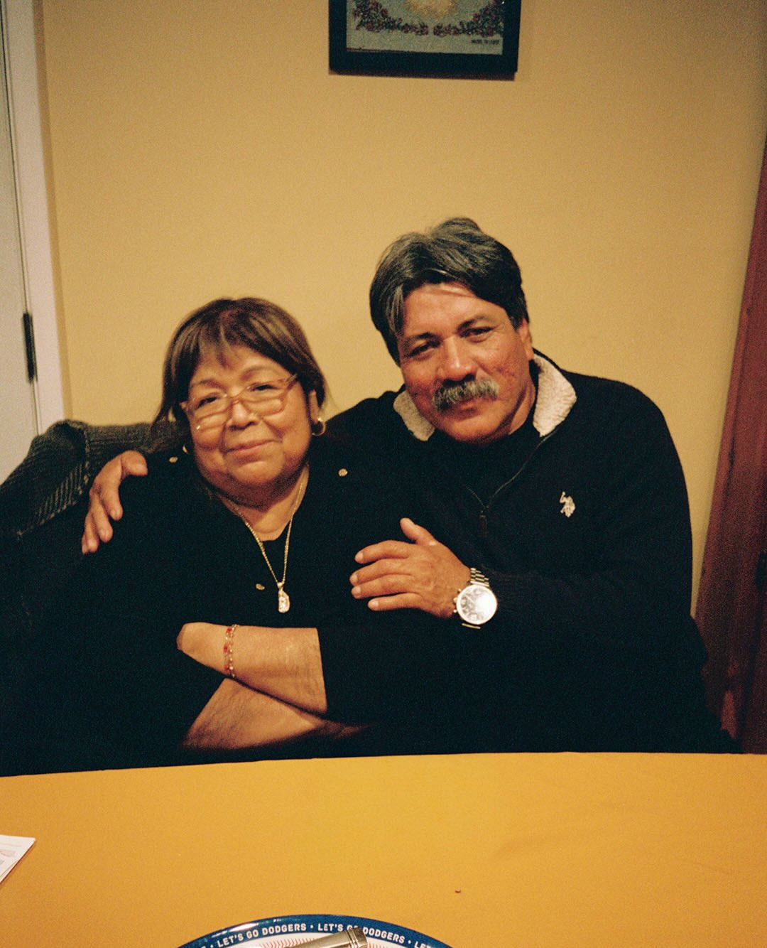 Today as the people of LA flood the streets to protest our tyrannical government and the reign of terror that ICE has inflicted upon our communities, I sit here with my mom. Reflecting on the years spent living in this country. She worked her ass off making cents (not dollars) trimming extra thread from garments. Making sure we had everything. Taking care of me and and my sisters and filling our lives with so much joy. My dad who came into our lives a bit later also endured so much. Working in construction he’s had so many accidents that would’ve had folks quitting. But he’s still out there to this day - breaking his back and not even getting paid for it bc his employers refuse to pay their workers. What makes them less than any other American in this country. They’re hardworking folks who’ve never begged for anything in this life. I’m proud to be their son. And today I’m filled with joy but who knows what tomorrow will hold. The only thing I hold on to is my moms hand and the certainty that I will continue to make choices that uplift our people, our culture and demonstrate that they raised me to be a kind and caring person. We are Mexican people but we’re also American. And I will continue to hold on to the hope that this country will recognize my parents worth.