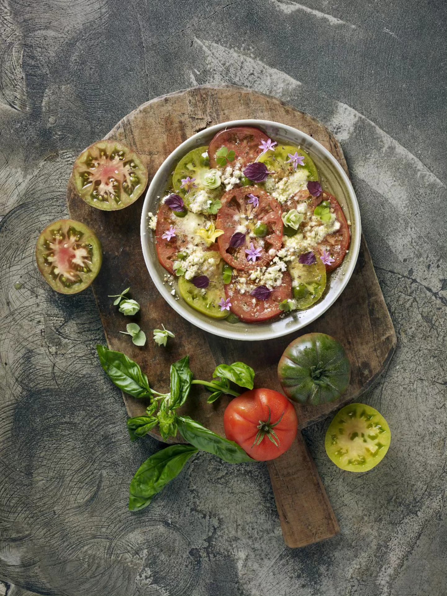 Griglia Recommends 🔥
Sicilian Tomatoes
Indulge in a vibrant plate of Sicilian tomatoes, brimming with summer vibes at $19++. This simple yet refreshing dish is the perfect start to your meal, with its piquant flavours and colourful medley of Italian heirloom tomatoes, topped with fragrant Sicilian oregano and crunchy Tarallo crumble.
Griglia Open Fire Italian Kitchen
(Singapore Tatler Best 2025 Recommended Restaurant)
Katong | 139 East Coast Road, 01-01
Tanjong Pagar | 37 Craig Road, 01-01