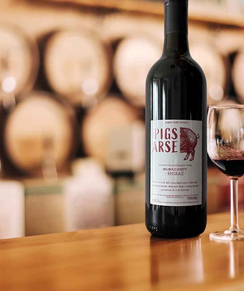 On cold nights, keep warm a little social intercourse and a glass of Pigs Arse Shiraz to order www.farmyardwines.com