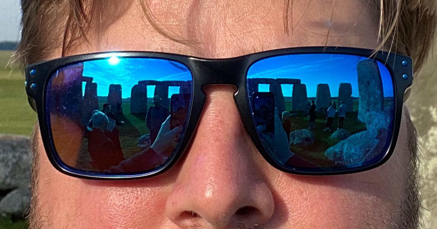 Now the Jubilee is over it’s time to look ahead to a summer of tours all over the country side.
I snapped this the other morning on a special tour with access to the centre of Stonehenge. It’s always very special to stand inside the stone circle. Have you done it yet? •
•
•
Hi I’m William Harry Mitchell, a Blue Badge Tourist Guide and Historical Interpreter. I lead tours around London and all over England. Want a tour? Have a look at my website (link in bio) for some ideas and get in touch through the contact form. @whmtours
#stonehenge #shades #sunglasses #reflections #extremecloseup #sunrise #sunshine #outside #insideoutside #history #ancientarchitecture #bluebadgetouristguide #tours #tour #tourguide #touristguide