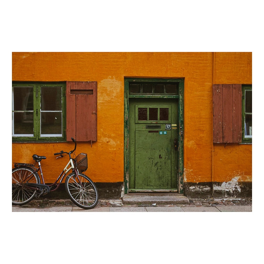 #copenhagen #oldbarracks #denmark #bikes #greendoor #yellowwall #nyboder #placephotography #senseofplace