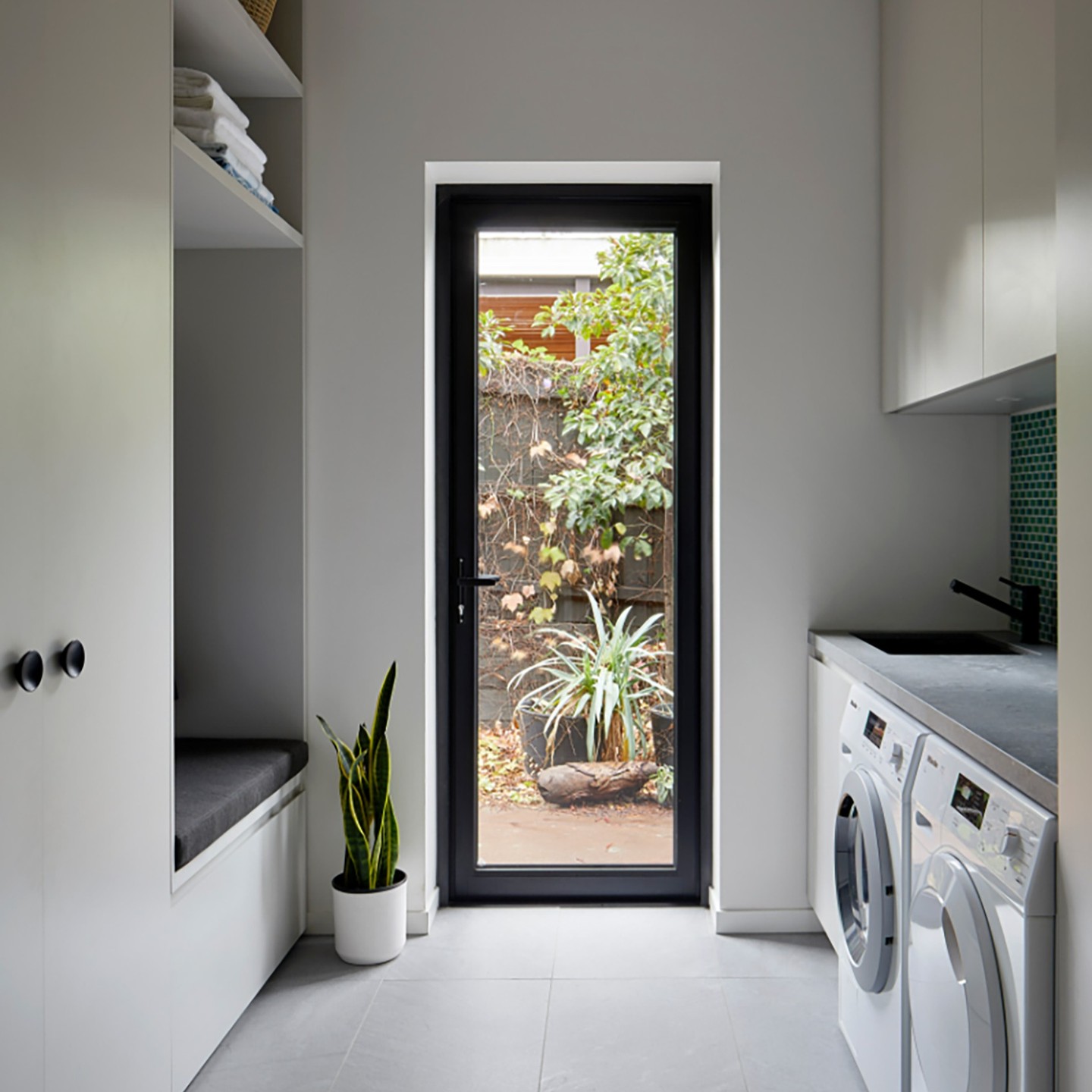 What if your laundry room became your favourite space in the house? Ok, maybe that’s pushing it — but we spend so much time in there, especially those who have families, that it needs to be a space we actually enjoy. Our top tips are to bring in as much natural light as possible, add in some clever and sleek storage, and create practical, thoughtful design. We’ve got loads of ways to turn this often-overlooked area into a true home gem.
