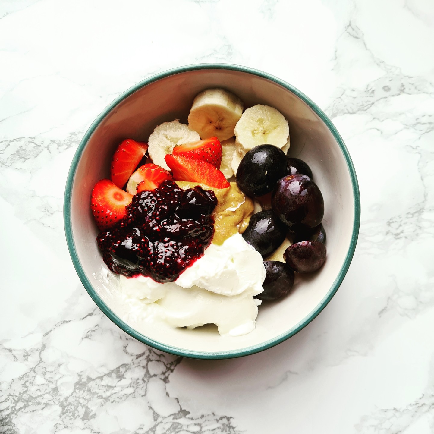 WHICH YOGHURT IS BEST?
I am asked often this ques. so thought I'd share my tips:
Regular Yoghurt: Creamy and slightly tangy, made by fermenting milk with live bacteria. Great for gut health if it contains ‘live cultures’. Opt for plain to avoid excess sugars; sweeten with fruit, honey, or maple syrup if desired. Full-fat yoghurt retains milk’s natural fat, keeping you fuller longer and aiding in the absorption of vitamins A, D, E, and K. It’s often a better choice over low-fat unless you’ve been advised to reduce saturated fat. 🥛🍯
Greek Yoghurt: Strained to remove whey, giving it a thicker texture, higher protein, and lower carbs/lactose. However, it has less calcium than regular yoghurt. Ideal for a high-protein snack! 💪🍶
Skyr : Similar to Greek yoghurt but with a slightly lighter texture and tangier taste. High in protein and great for a filling, nutritious option! 🥄
Kefir Yoghurt: Fermented with a wide variety of probiotics, kefir is excellent for gut health and easier on lactose intolerance. It has a thinner consistency and a tangy flavour. 🌿🦠
Oat: Plant-based and perfect for those avoiding dairy. Creamy with a mild flavour and high in fibre, though lower in protein. Great for sweet or savoury dishes! 🌾💚
Soya: Made from soybeans, this plant-based yoghurt is high in protein and often contains live cultures. A good choice for those with dairy or nut allergies. 🌱🥛
Almond: Light and nutty, made from almond milk. Lower in protein but great with high-protein toppings. Ideal if you’re looking for a lower-calorie, plant-based option. 🌰✨
Coconut: Rich and creamy with a distinct coconut flavour. Best enjoyed as a treat due to its high saturated fat content. 🥥🍨
In Summary:
✨ Choose yoghurts with minimal ingredients.
✨ Opt for plain and add your own natural sweeteners.
✨ For higher protein, go for Greek, Skyr, or soya.
✨ For higher calcium, regular yoghurt is best.
✨ For gut health, choose kefir or yoghurts with live cultures.
✨ If dairy-free, soya is closest to cow’s milk yoghurt.
🌟🥄 #YoghurtGuide #NutritionTips #